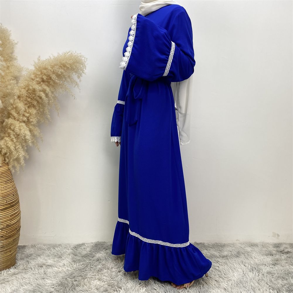 A Muslim Dubai Turkish Arab dress with white lace and front zipper and large hem is on sale in East Dubai