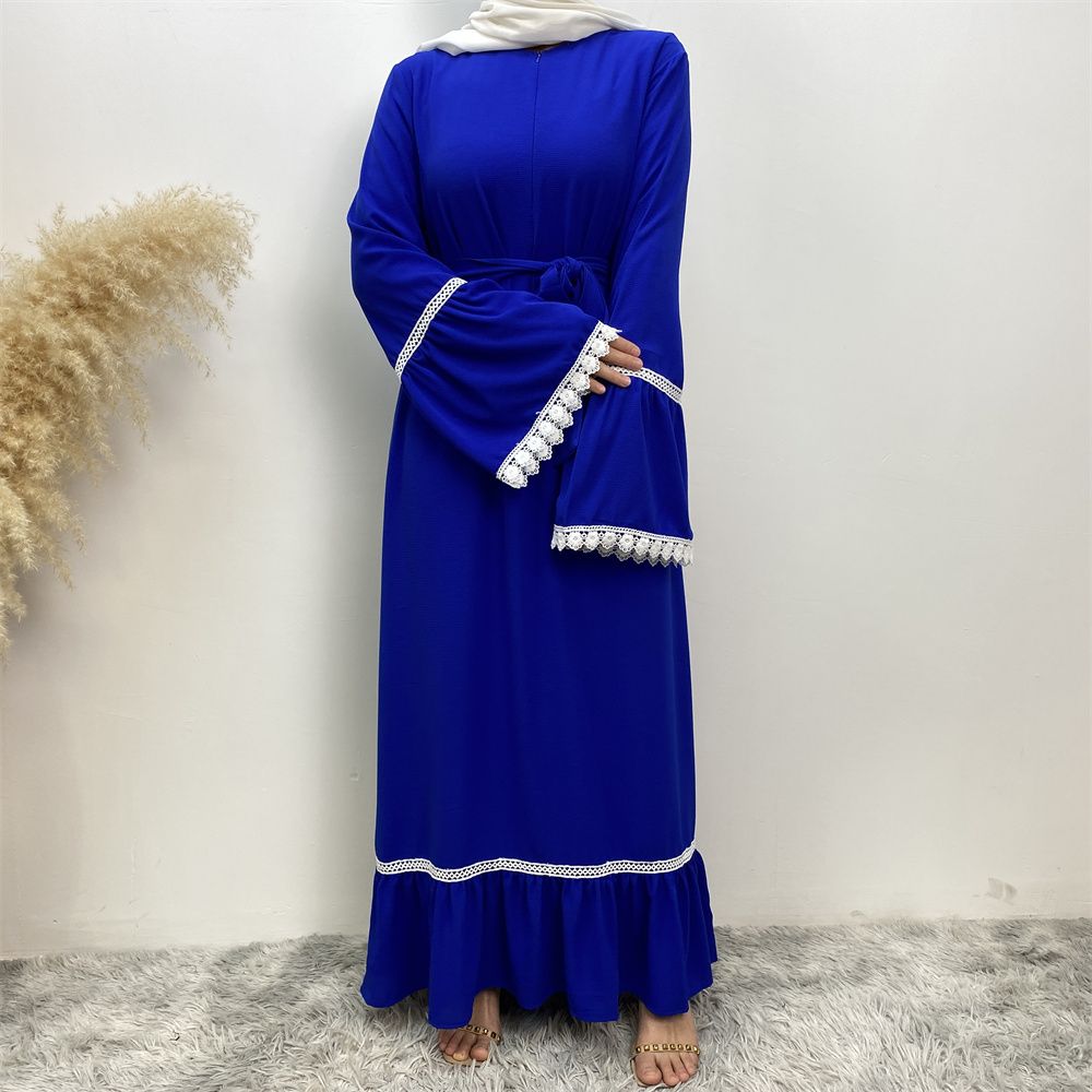 A Muslim Dubai Turkish Arab dress with white lace and front zipper and large hem is on sale in East Dubai