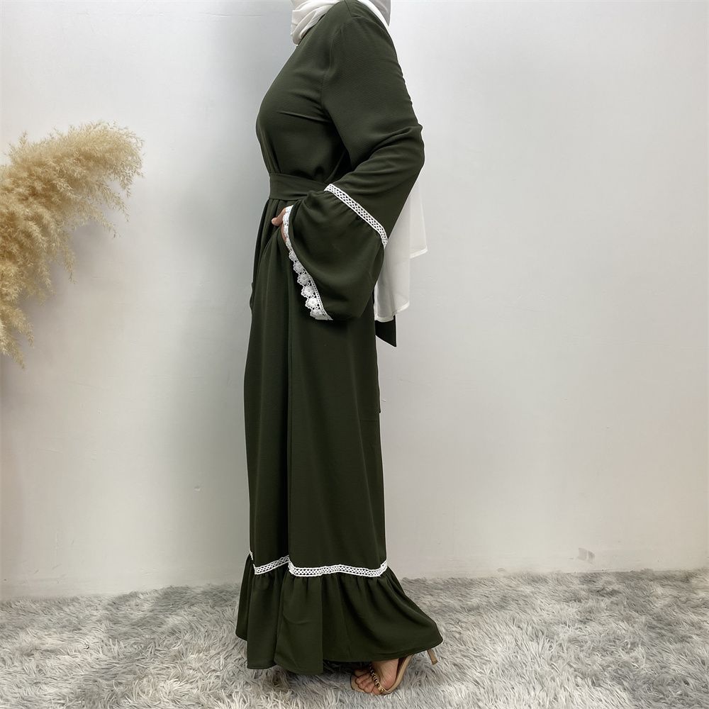 A Muslim Dubai Turkish Arab dress with white lace and front zipper and large hem is on sale in East Dubai