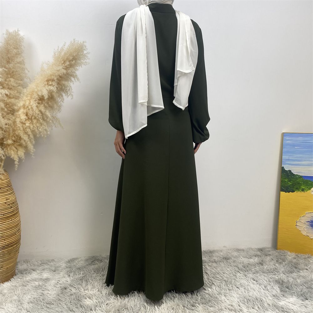 The Muslim Middle East is selling a summer chiffon long dress in solid color with loose buttons and pockets