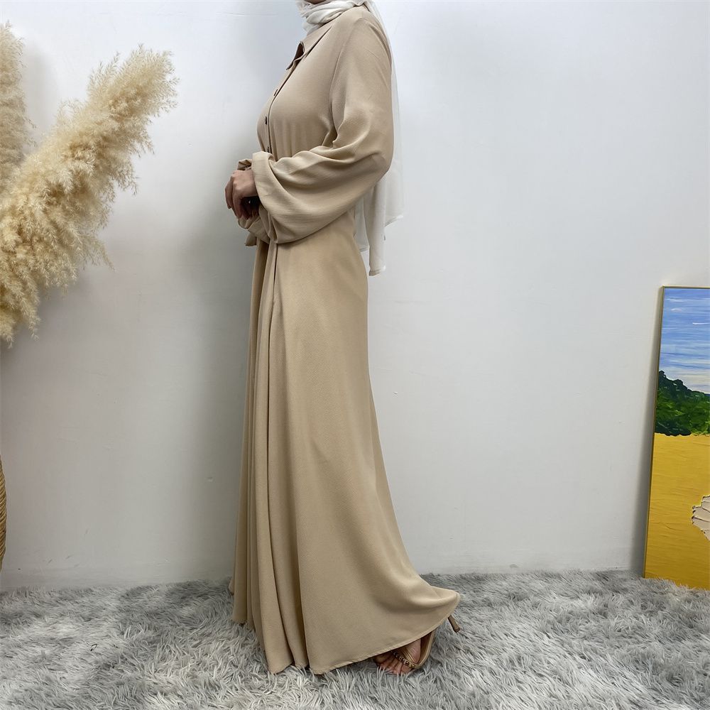 The Muslim Middle East is selling a summer chiffon long dress in solid color with loose buttons and pockets