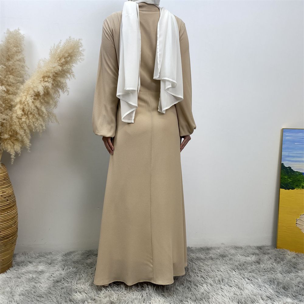 The Muslim Middle East is selling a summer chiffon long dress in solid color with loose buttons and pockets
