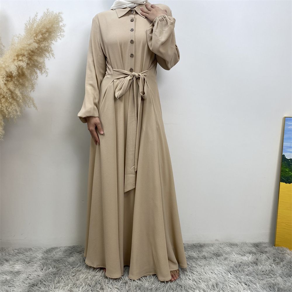 The Muslim Middle East is selling a summer chiffon long dress in solid color with loose buttons and pockets