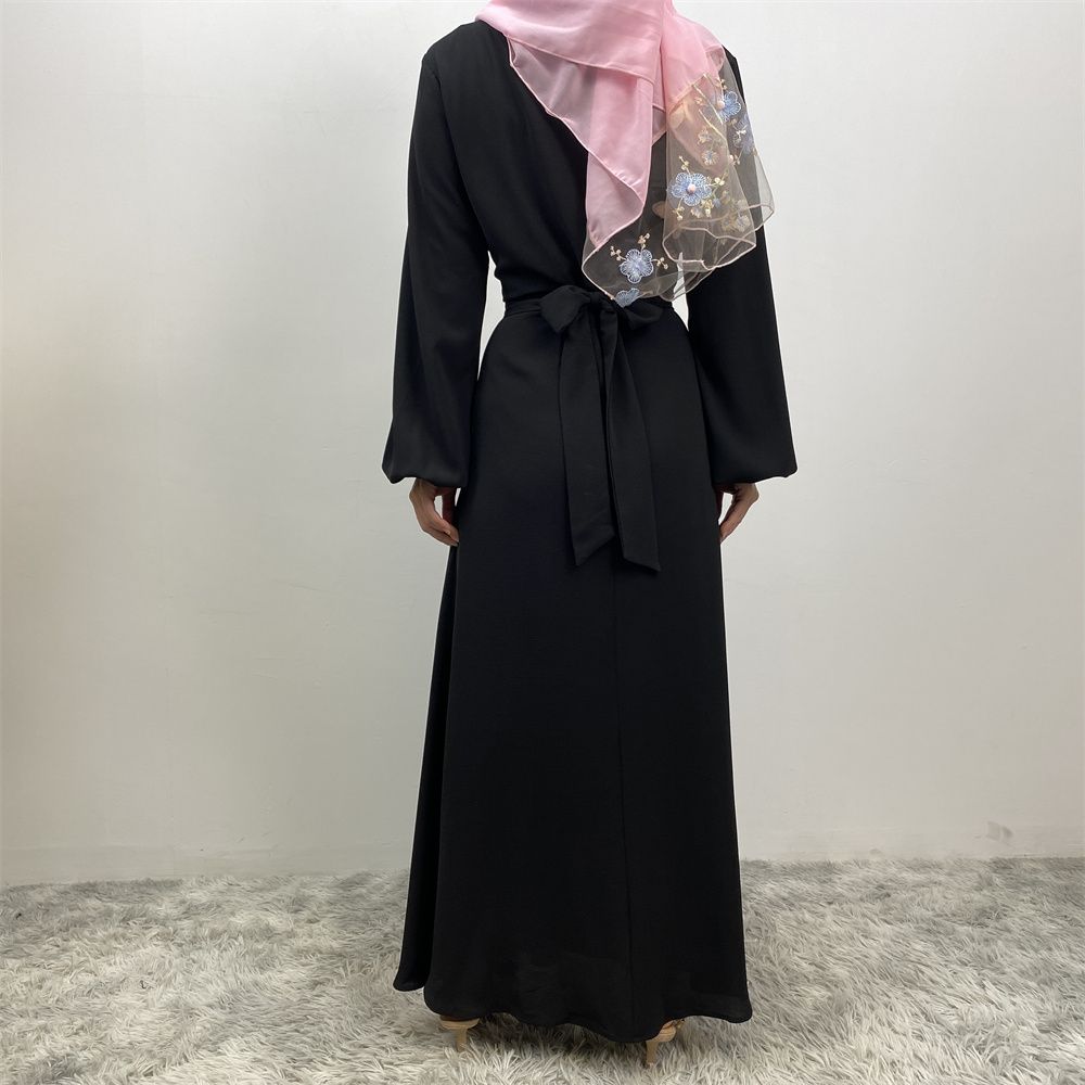 The Muslim Middle East is selling a summer chiffon long dress in solid color with loose buttons and pockets
