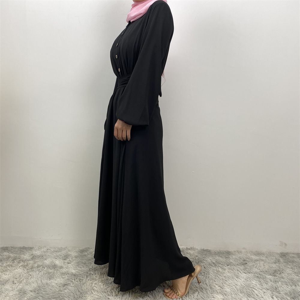 The Muslim Middle East is selling a summer chiffon long dress in solid color with loose buttons and pockets