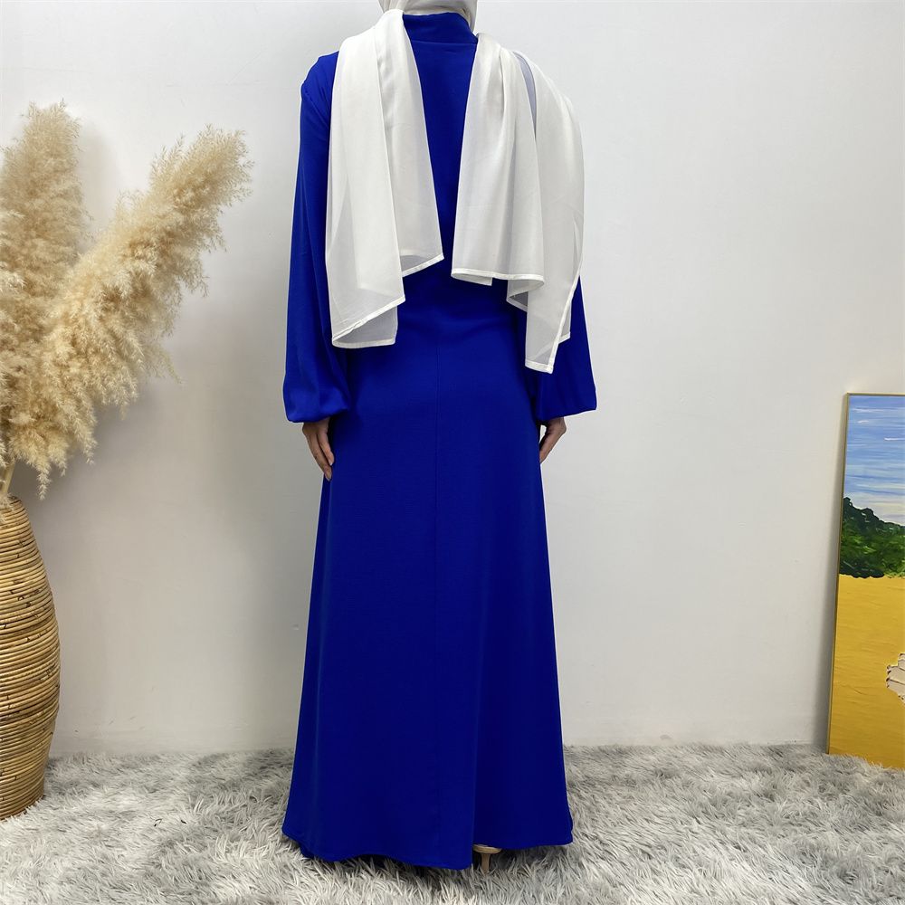The Muslim Middle East is selling a summer chiffon long dress in solid color with loose buttons and pockets