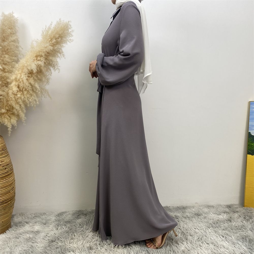 The Muslim Middle East is selling a summer chiffon long dress in solid color with loose buttons and pockets