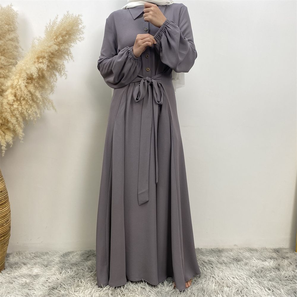 The Muslim Middle East is selling a summer chiffon long dress in solid color with loose buttons and pockets