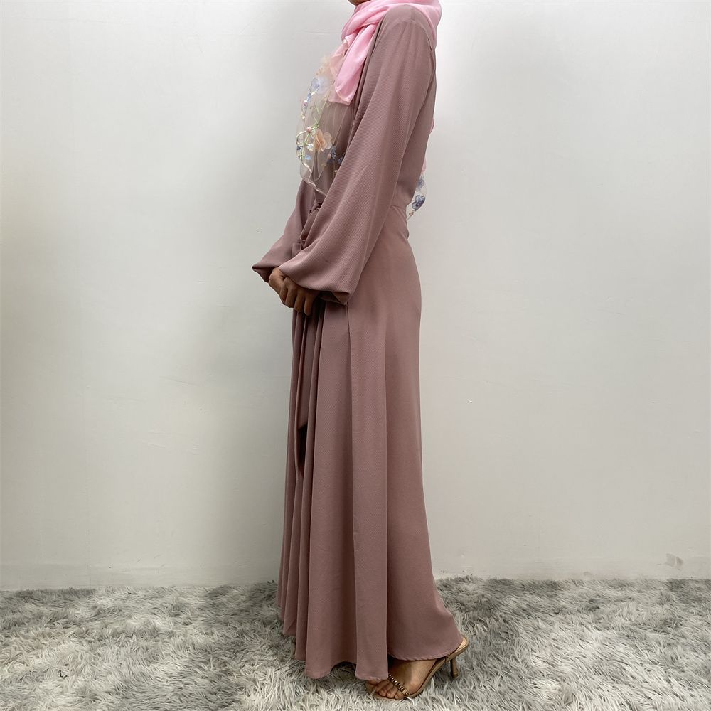 The Muslim Middle East is selling a summer chiffon long dress in solid color with loose buttons and pockets