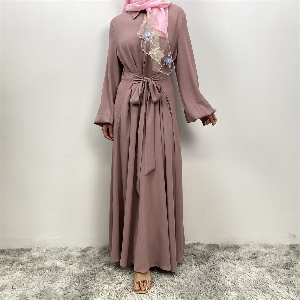 The Muslim Middle East is selling a summer chiffon long dress in solid color with loose buttons and pockets