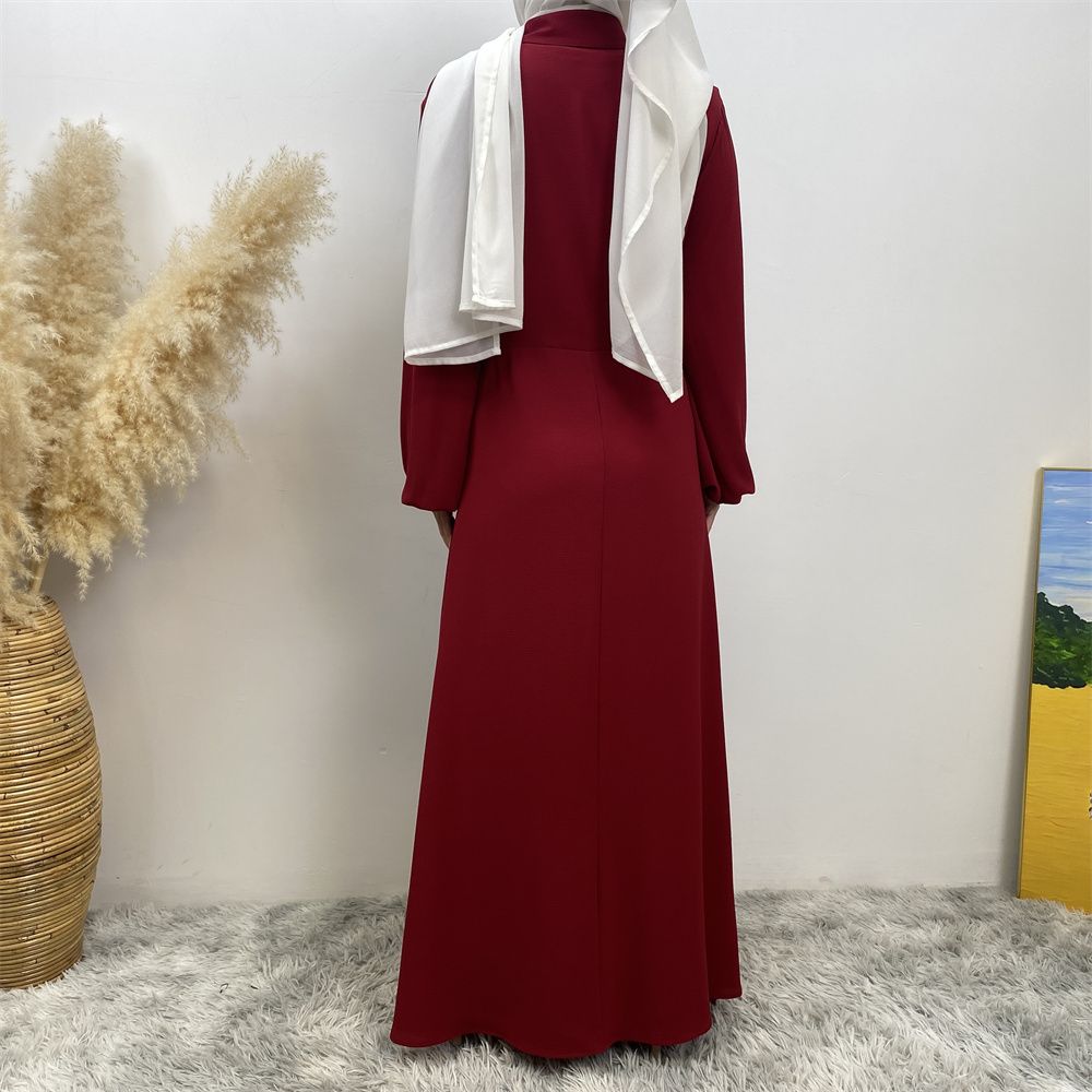 The Muslim Middle East is selling a summer chiffon long dress in solid color with loose buttons and pockets