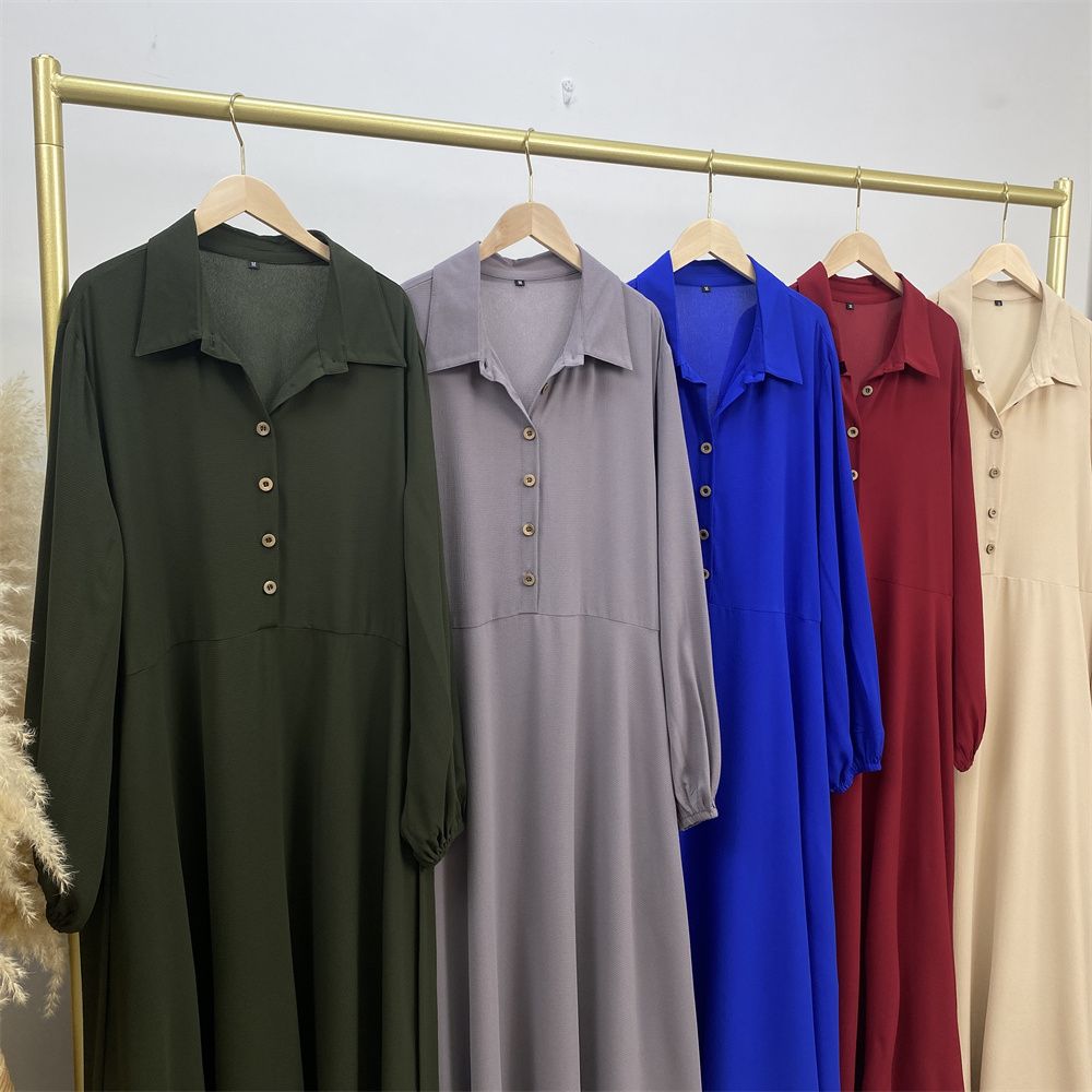 The Muslim Middle East is selling a summer chiffon long dress in solid color with loose buttons and pockets