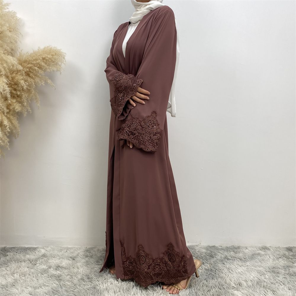 A long Muslim cardigan women's dress with fashionable and casual lace embroidery from Dubai, Turkey, in the Middle East