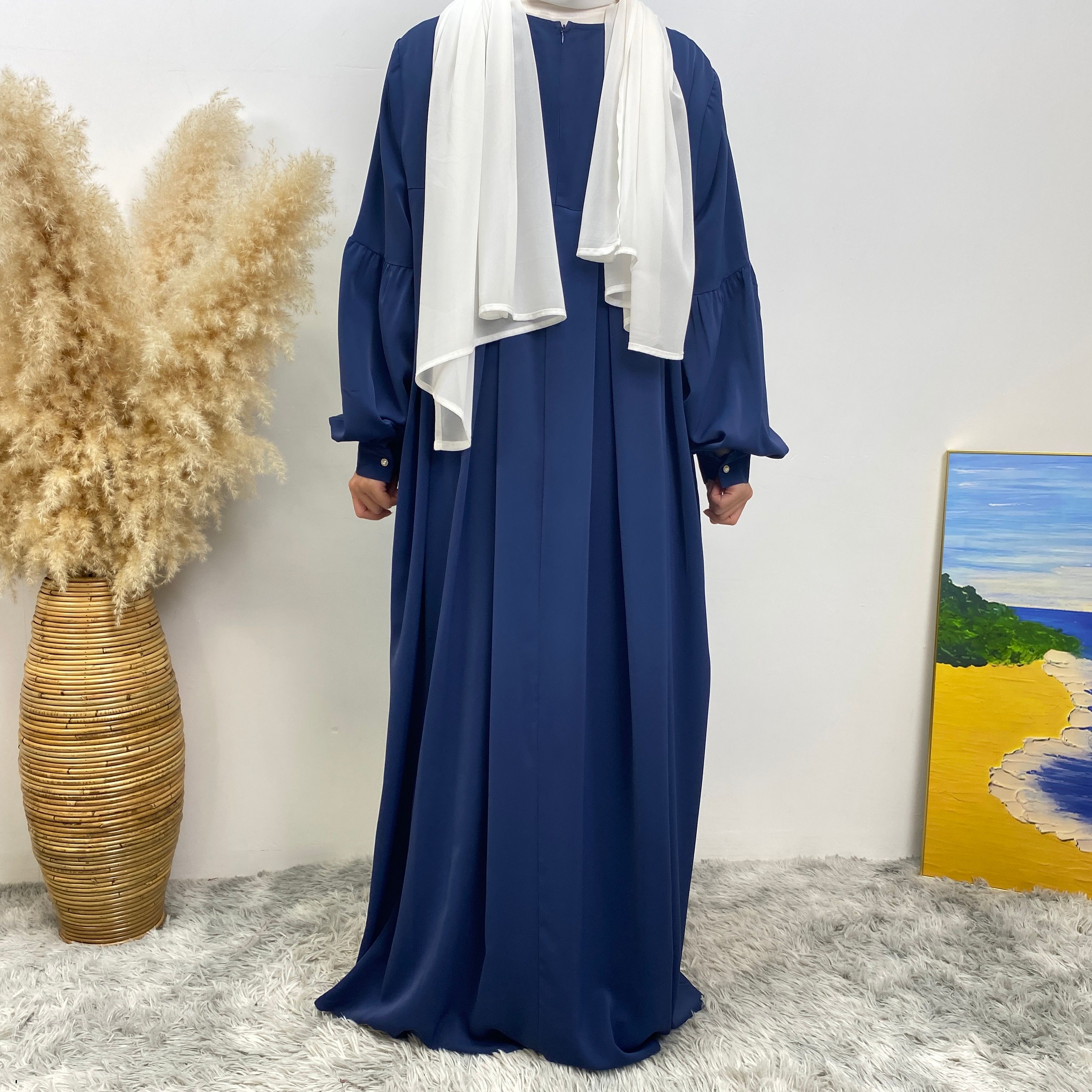 n with poThe new Middle Eastern Muslim women's round-neck abaya dress, an elegant solid-color summer pleated dress for Islamic womeckets