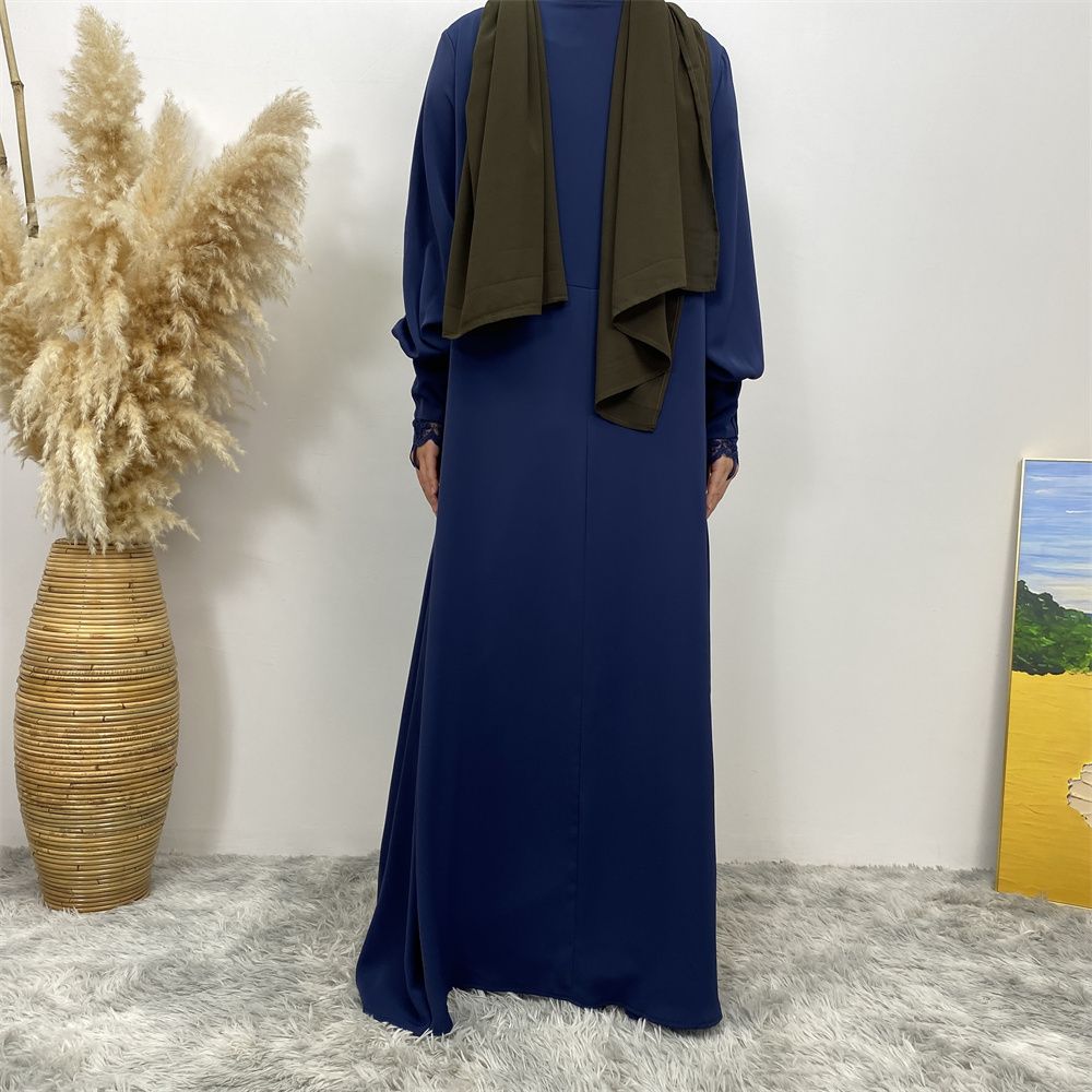 A simple and luxurious Muslim Middle Eastern woman's dress with lace zippers, an Islamic Turkish pleated front zipper, and an Arab Turkish cardigan robe