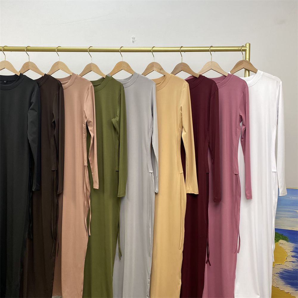 Muslim Dubai Arab solid-color long-sleeved dress for women with a drawstring base layer on the side