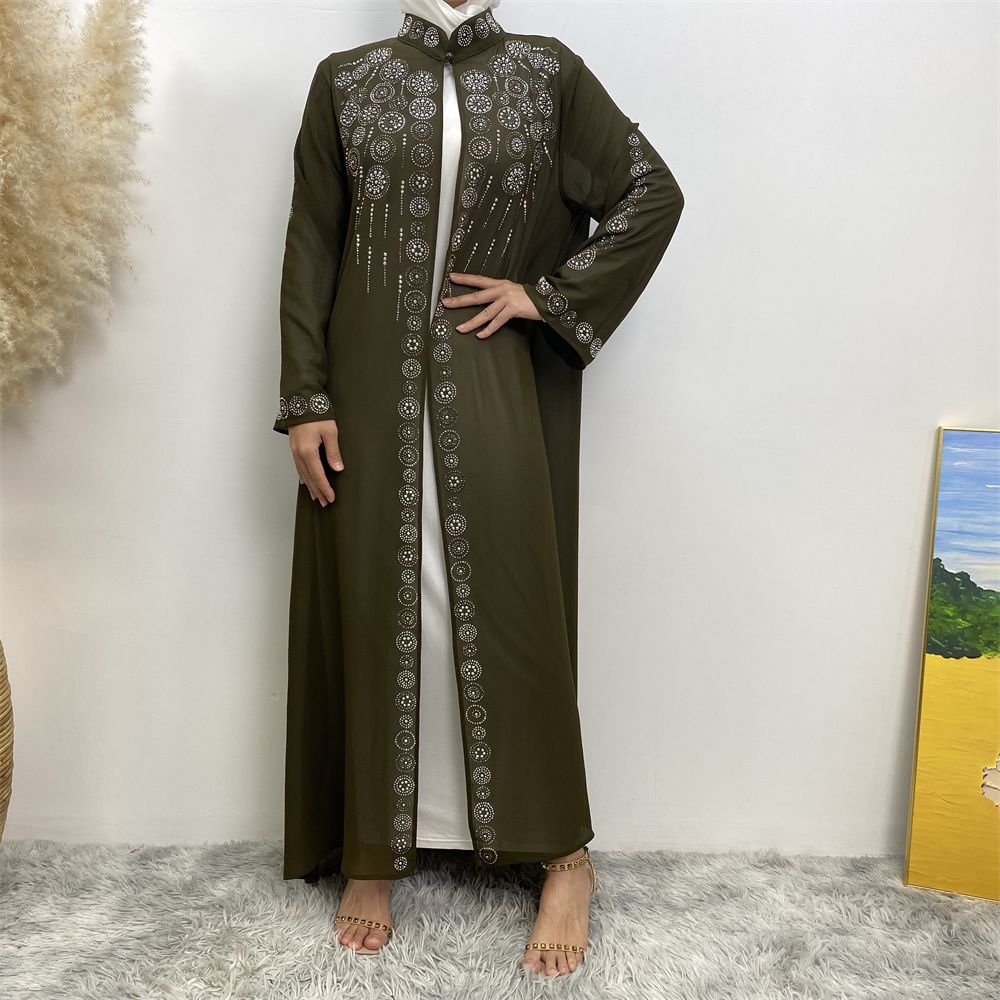 A fashionable Middle Eastern Muslim cardigan dress with hot diamonds is selling well in Dubai, Morocco