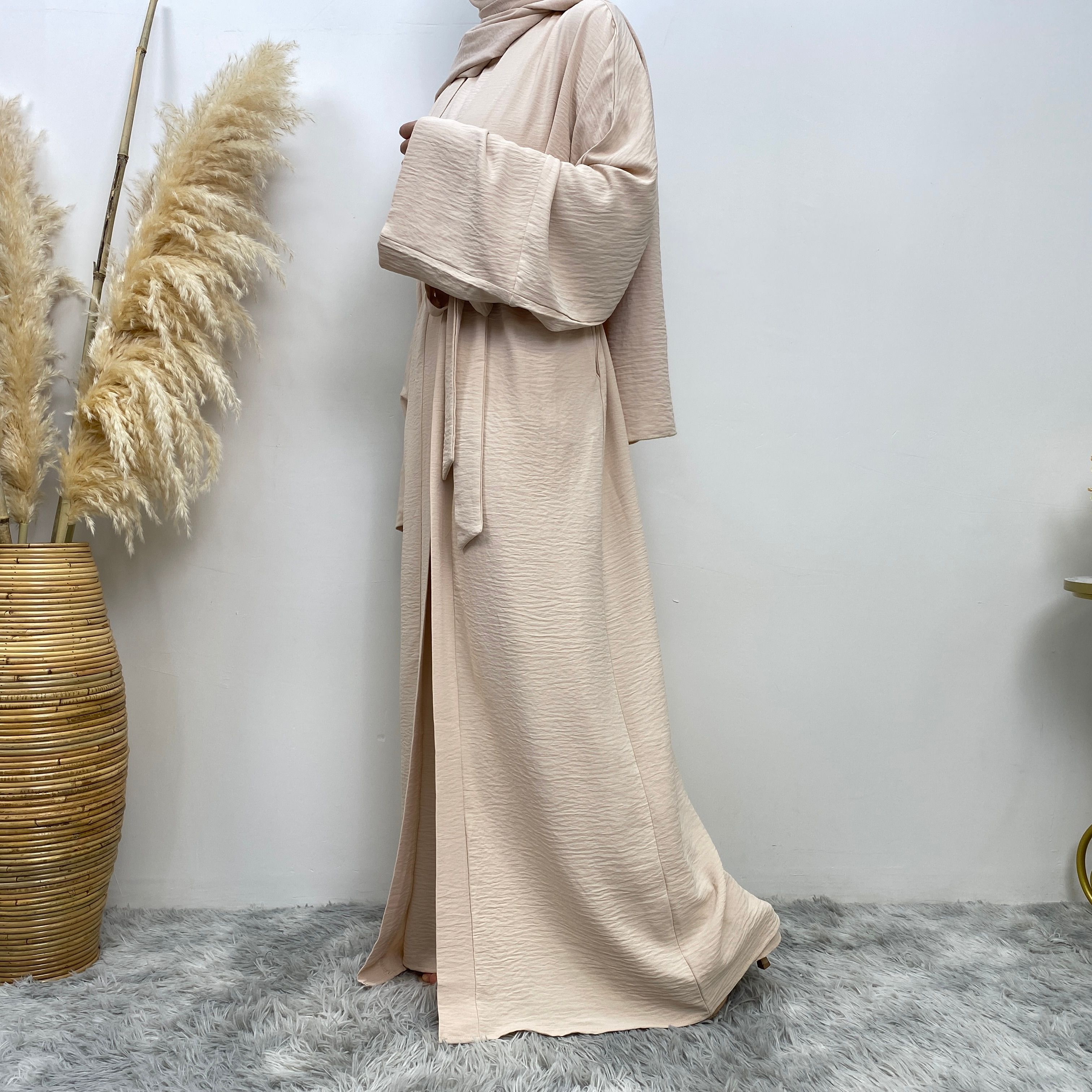 Middle Eastern simple and fashionable Muslim suit Abaya sleeveless dress with pockets for women cardigan dress