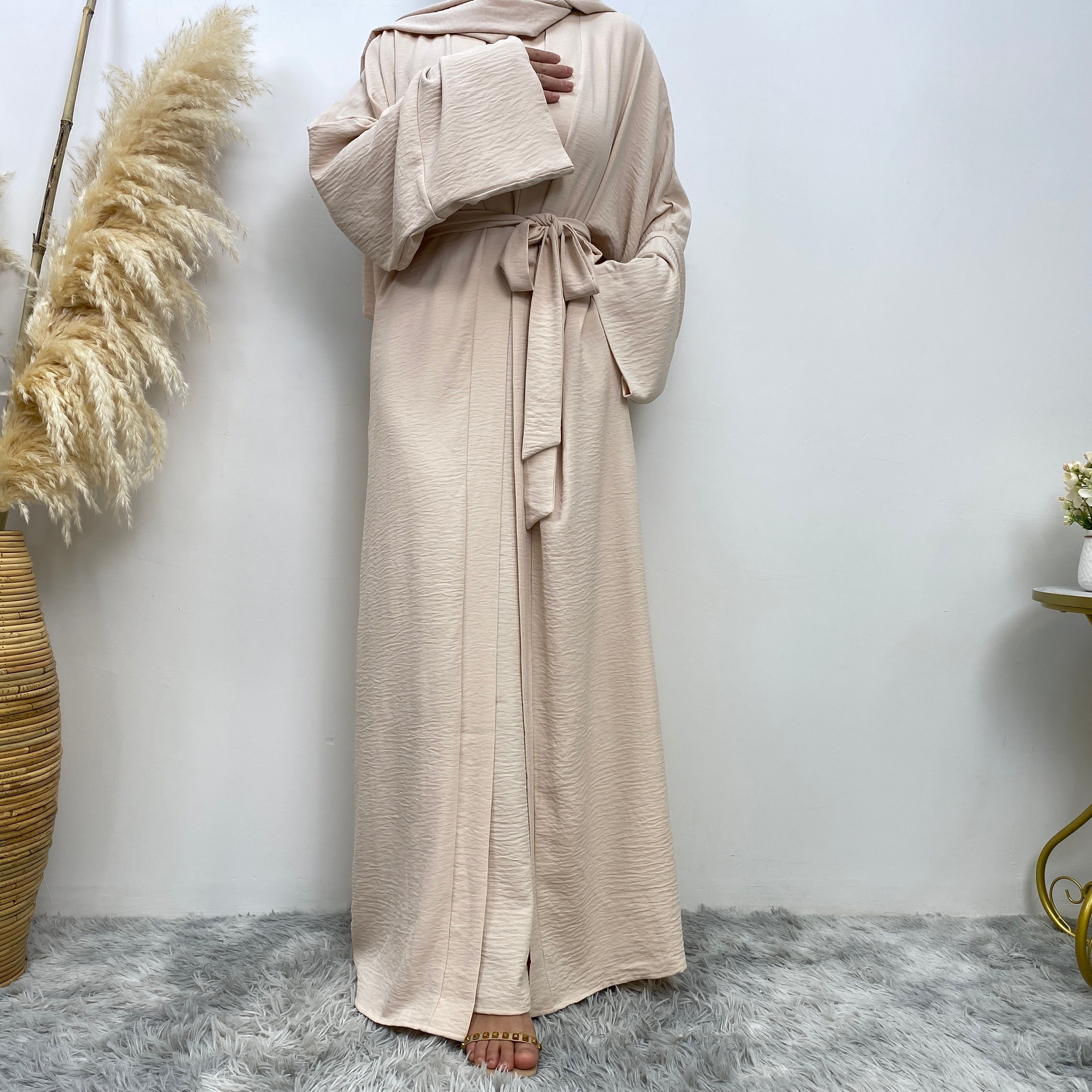 Middle Eastern simple and fashionable Muslim suit Abaya sleeveless dress with pockets for women cardigan dress