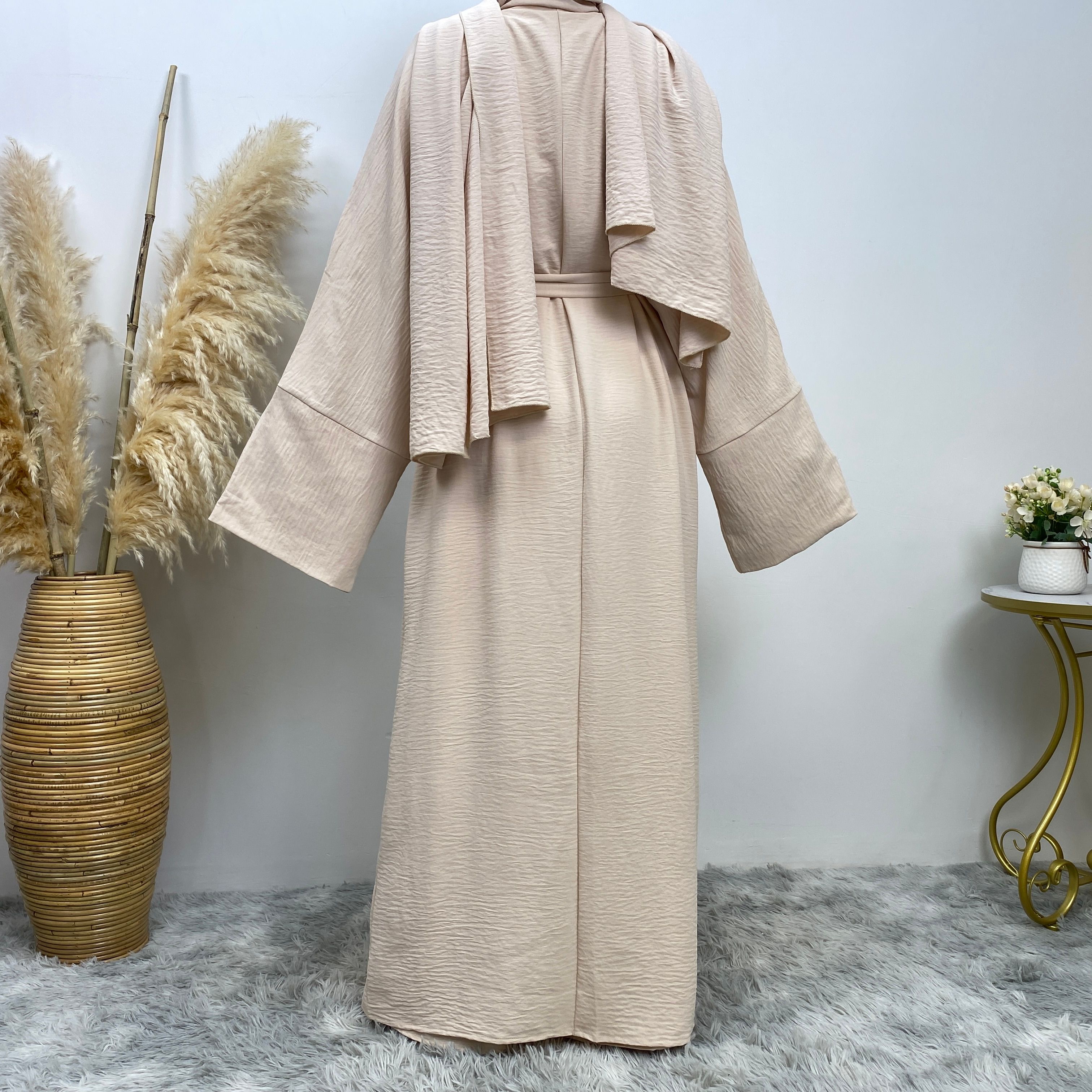 Middle Eastern simple and fashionable Muslim suit Abaya sleeveless dress with pockets for women cardigan dress