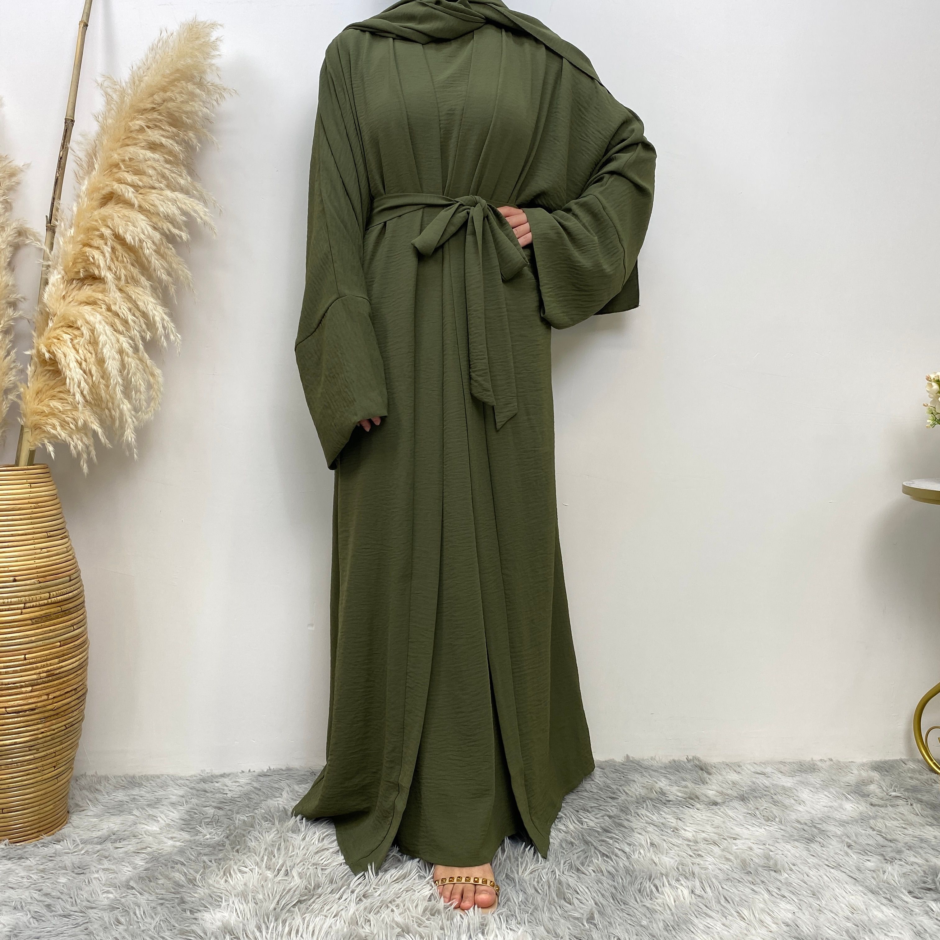 Middle Eastern simple and fashionable Muslim suit Abaya sleeveless dress with pockets for women cardigan dress