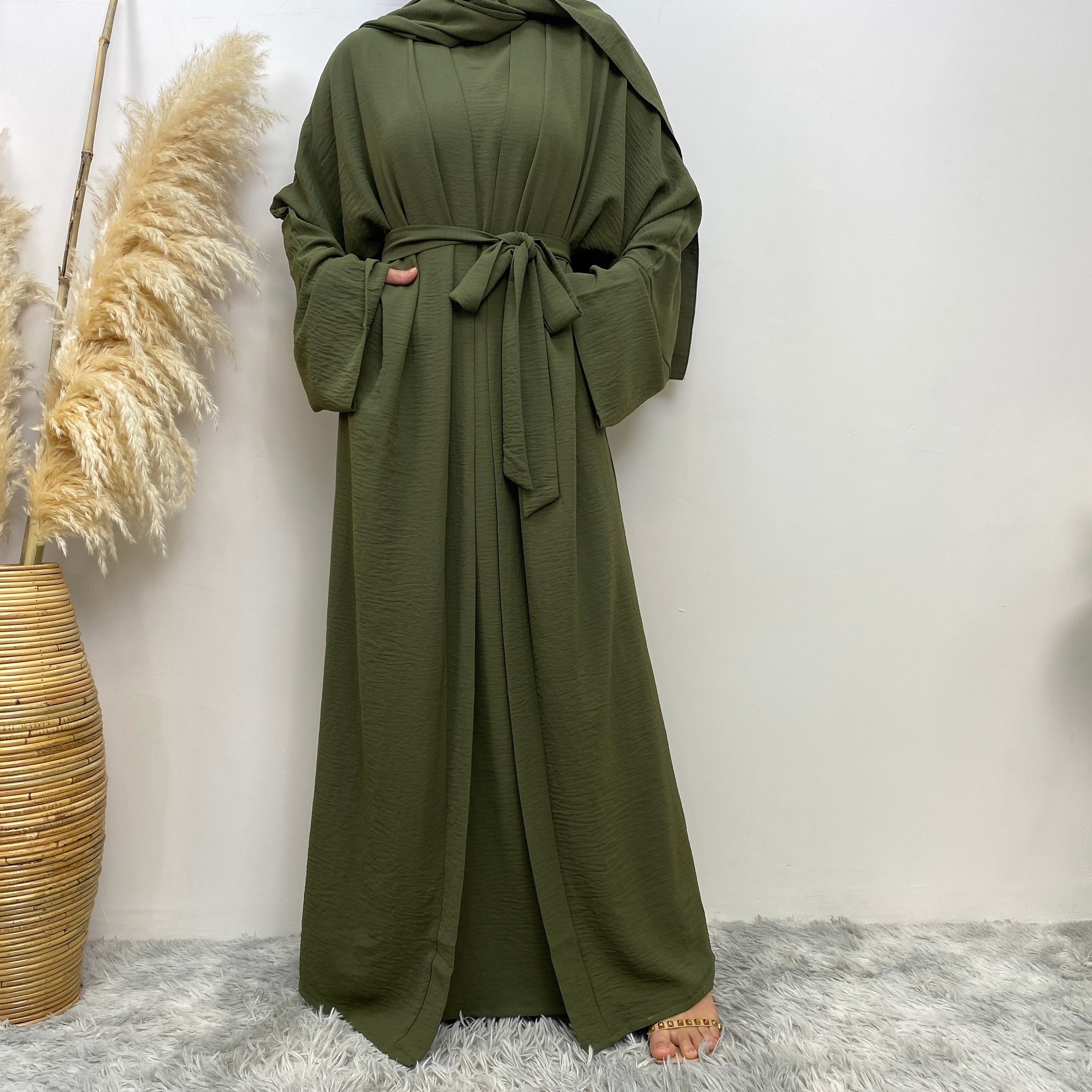 Middle Eastern simple and fashionable Muslim suit Abaya sleeveless dress with pockets for women cardigan dress