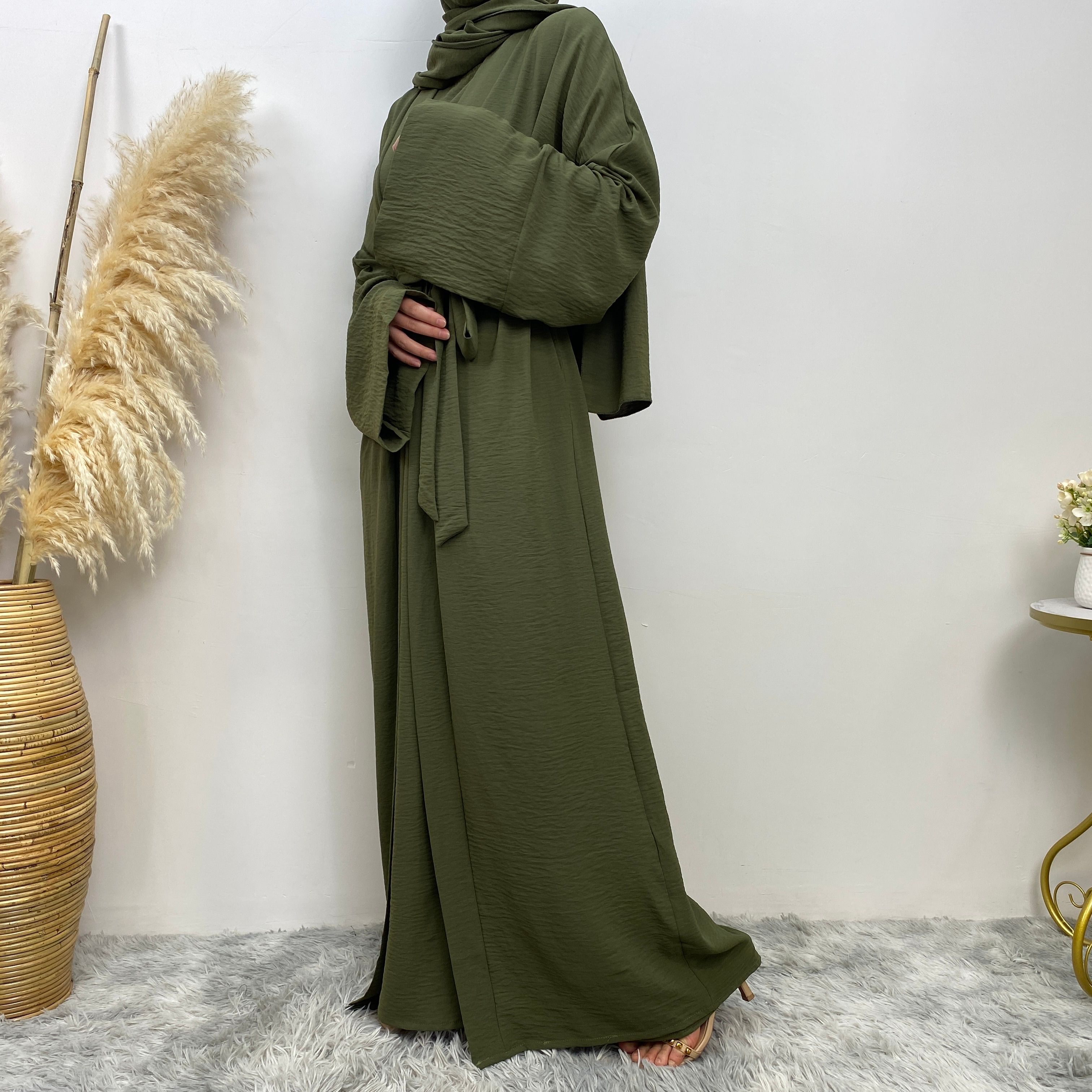 Middle Eastern simple and fashionable Muslim suit Abaya sleeveless dress with pockets for women cardigan dress