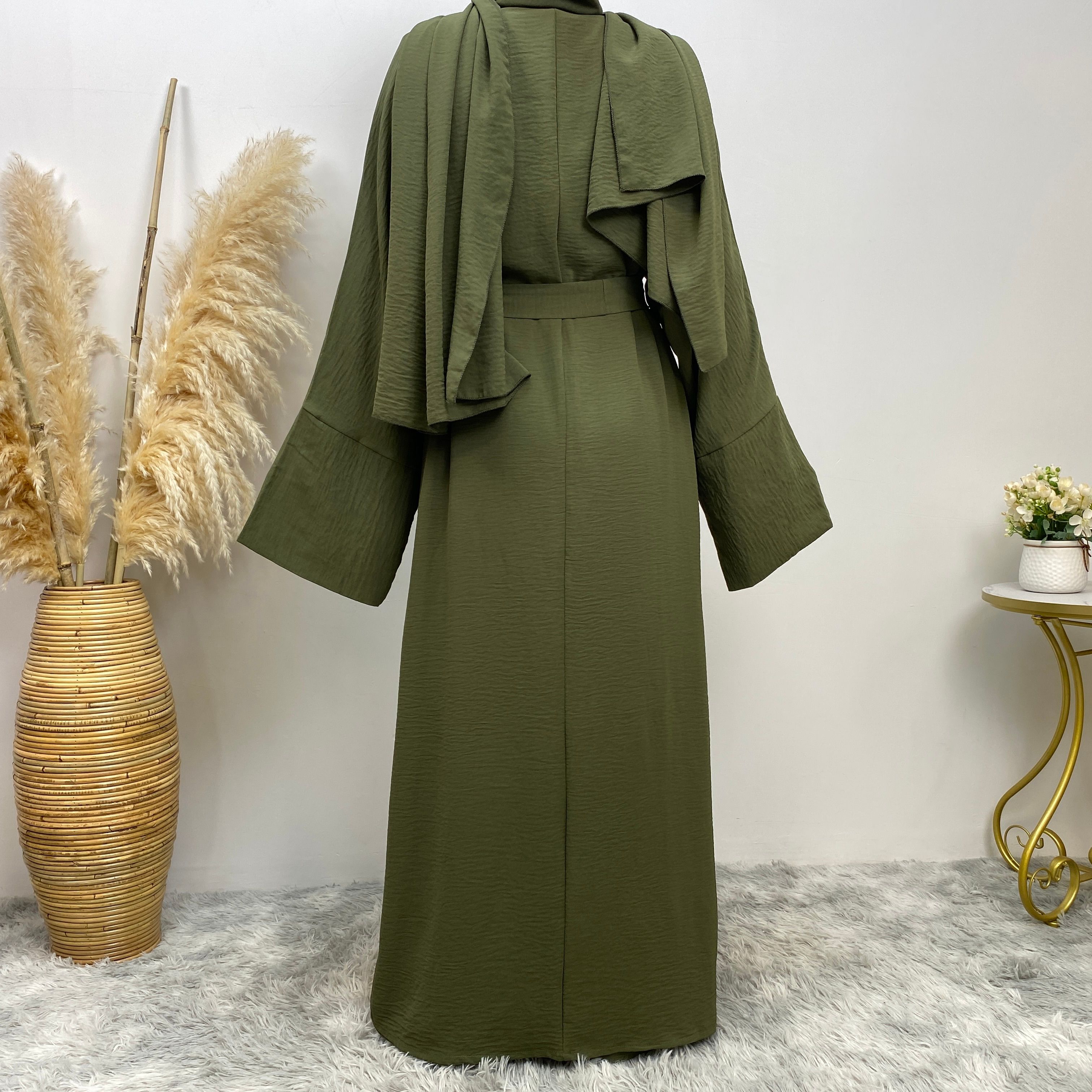Middle Eastern simple and fashionable Muslim suit Abaya sleeveless dress with pockets for women cardigan dress
