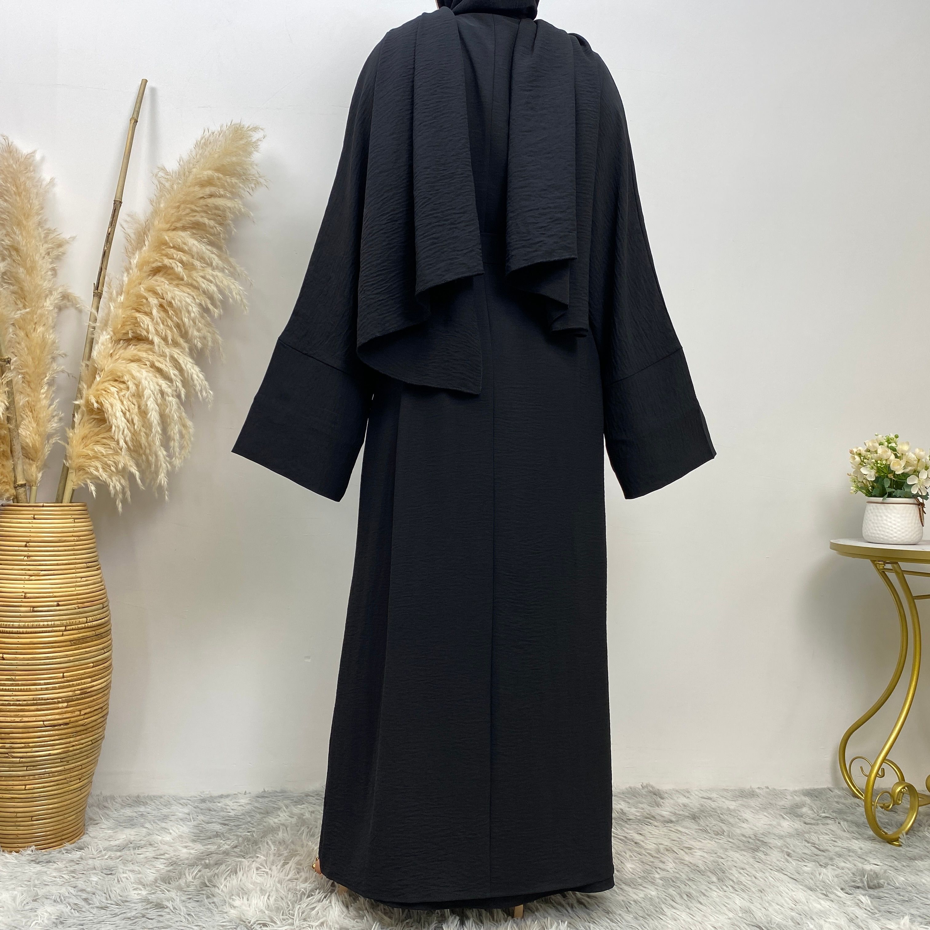 Middle Eastern simple and fashionable Muslim suit Abaya sleeveless dress with pockets for women cardigan dress