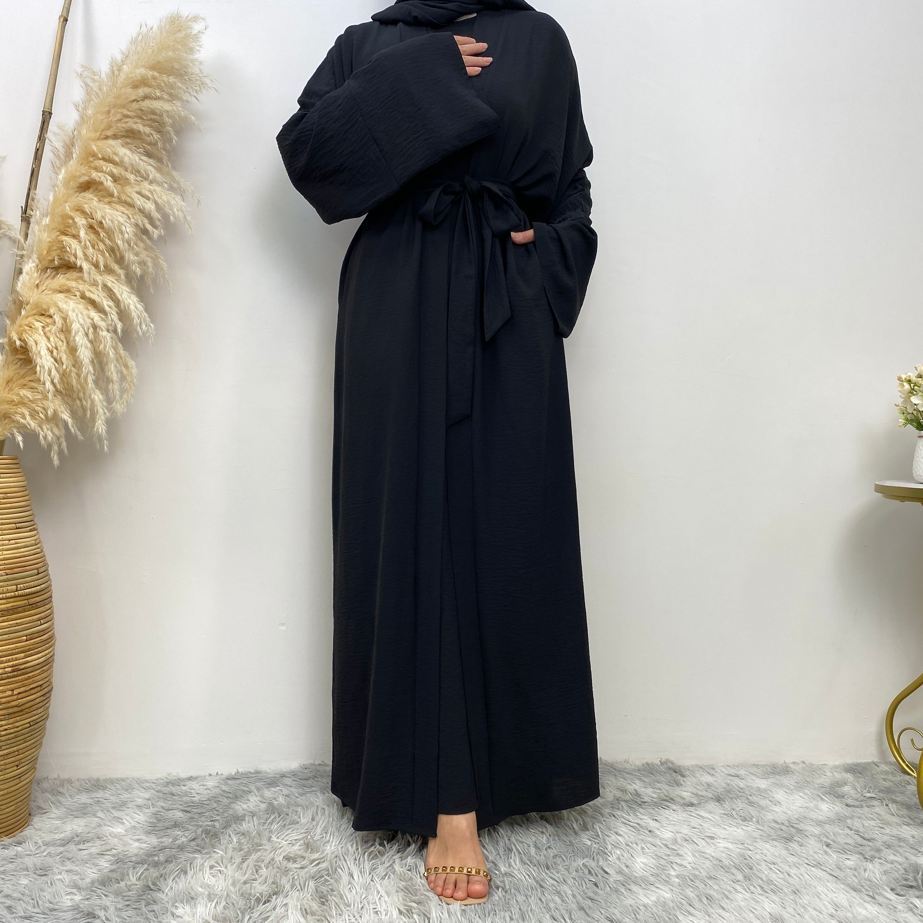 Middle Eastern simple and fashionable Muslim suit Abaya sleeveless dress with pockets for women cardigan dress