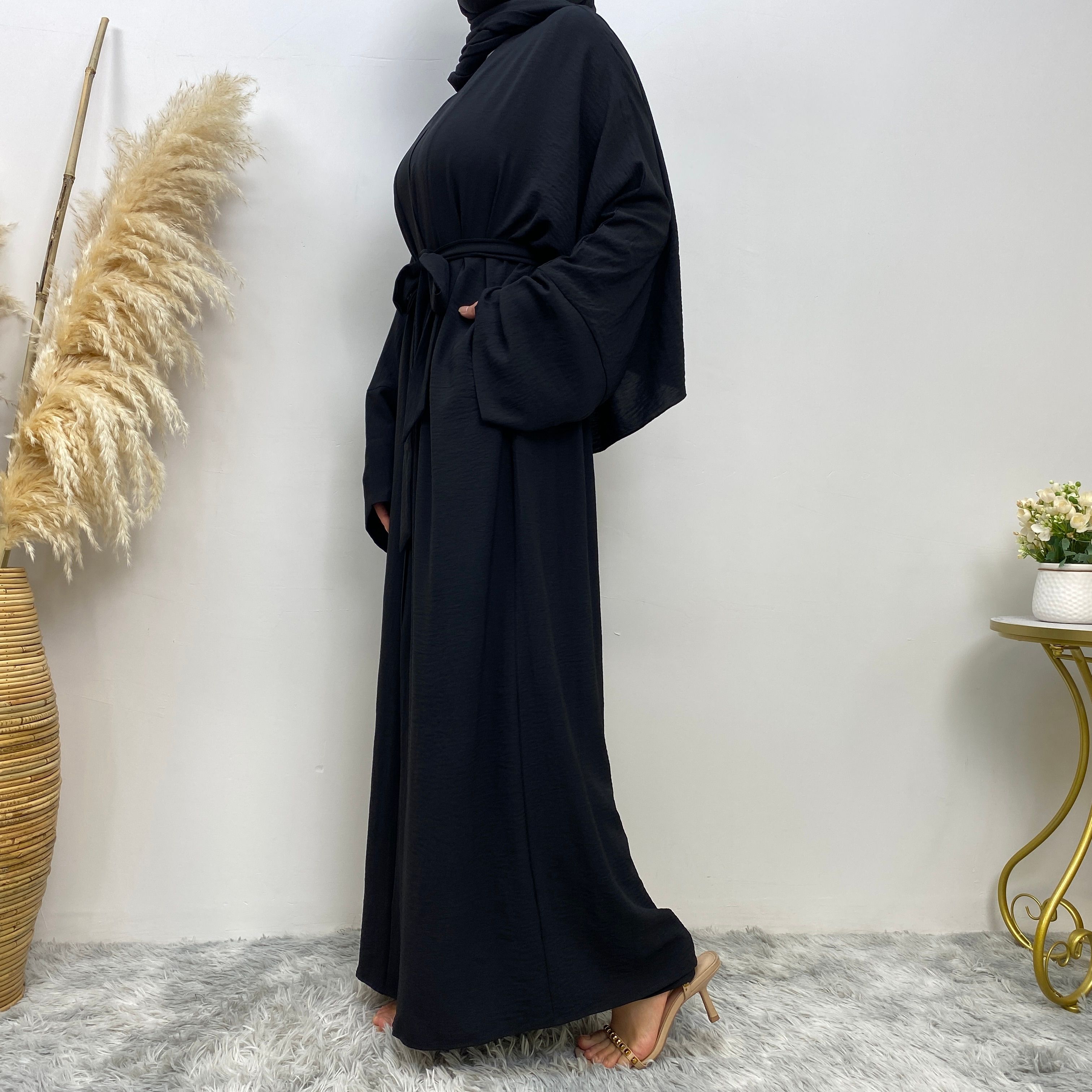 Middle Eastern simple and fashionable Muslim suit Abaya sleeveless dress with pockets for women cardigan dress
