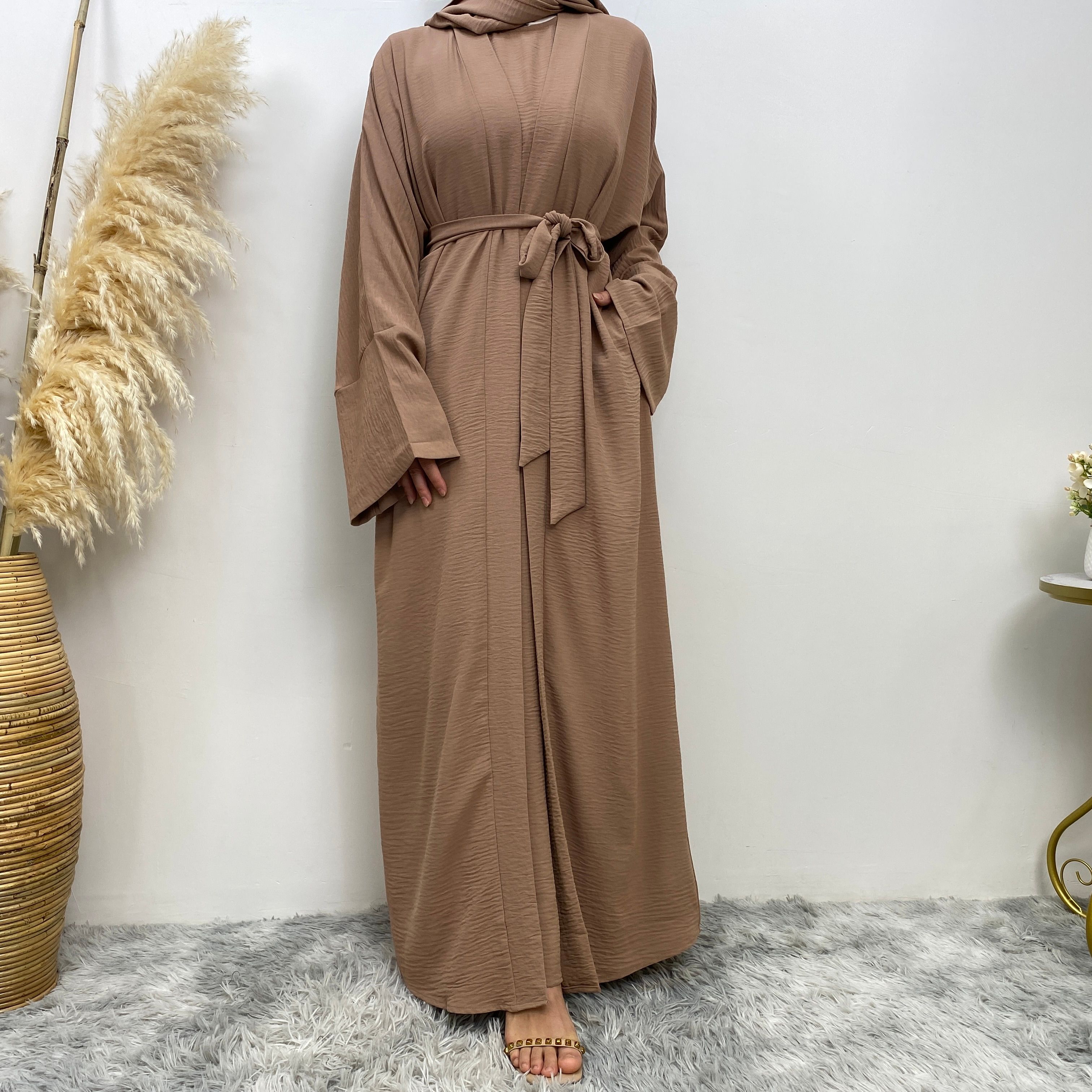 Middle Eastern simple and fashionable Muslim suit Abaya sleeveless dress with pockets for women cardigan dress