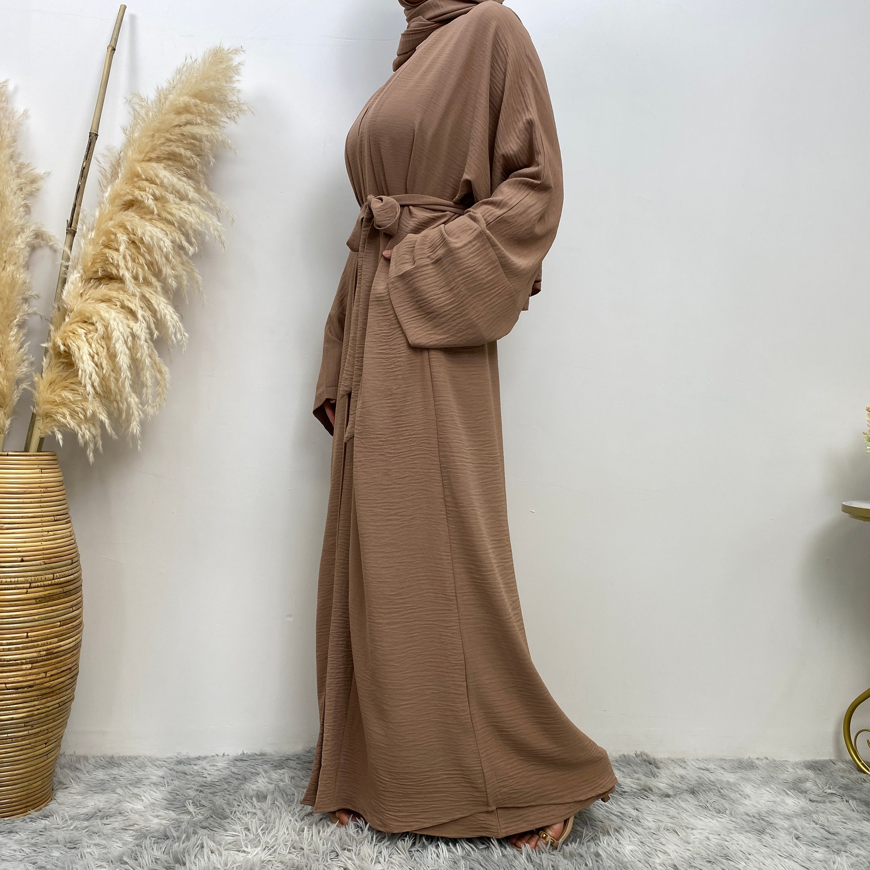 Middle Eastern simple and fashionable Muslim suit Abaya sleeveless dress with pockets for women cardigan dress