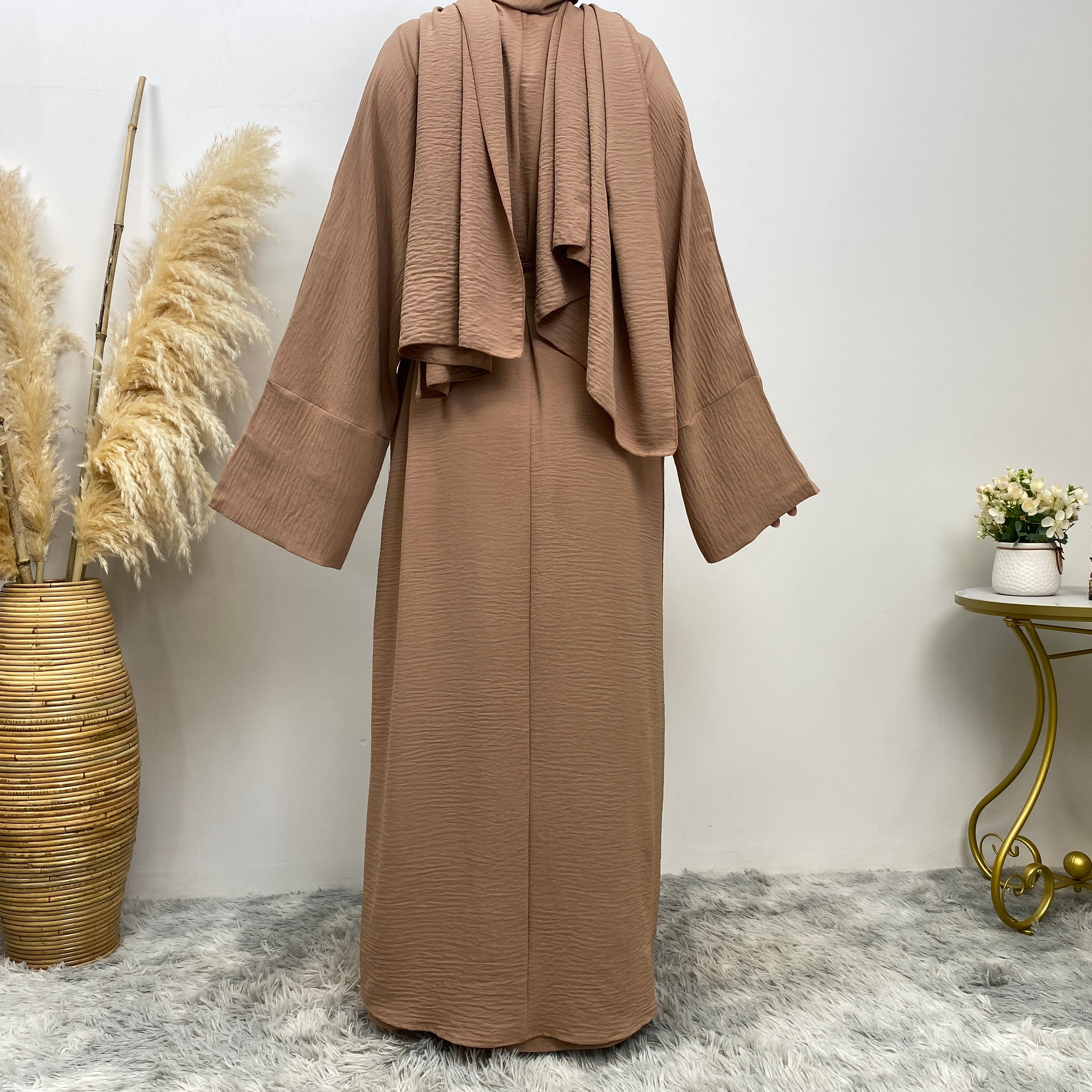 Middle Eastern simple and fashionable Muslim suit Abaya sleeveless dress with pockets for women cardigan dress