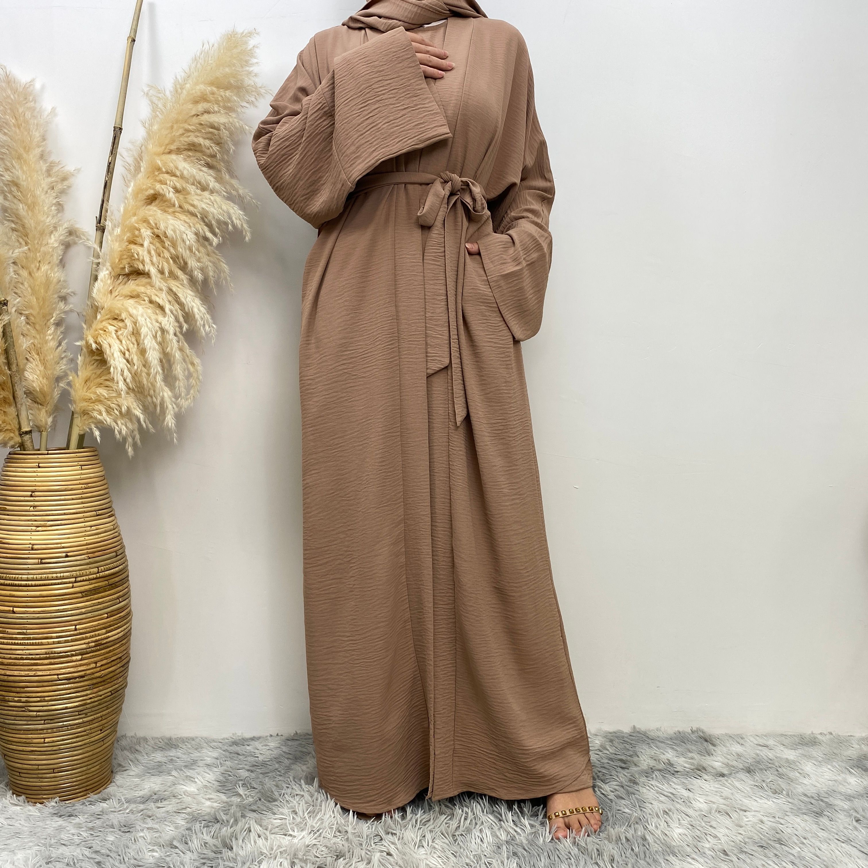 Middle Eastern simple and fashionable Muslim suit Abaya sleeveless dress with pockets for women cardigan dress
