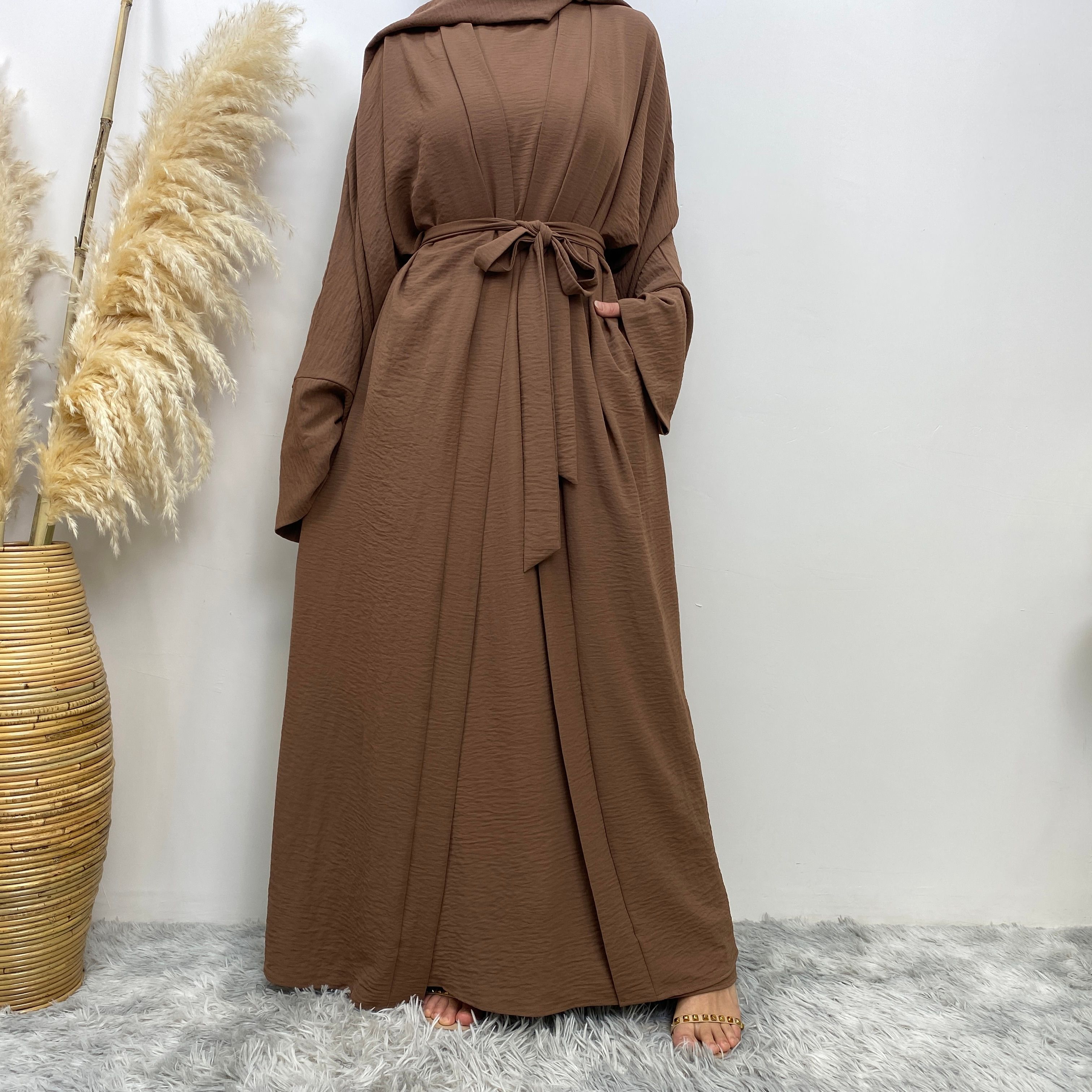 Middle Eastern simple and fashionable Muslim suit Abaya sleeveless dress with pockets for women cardigan dress