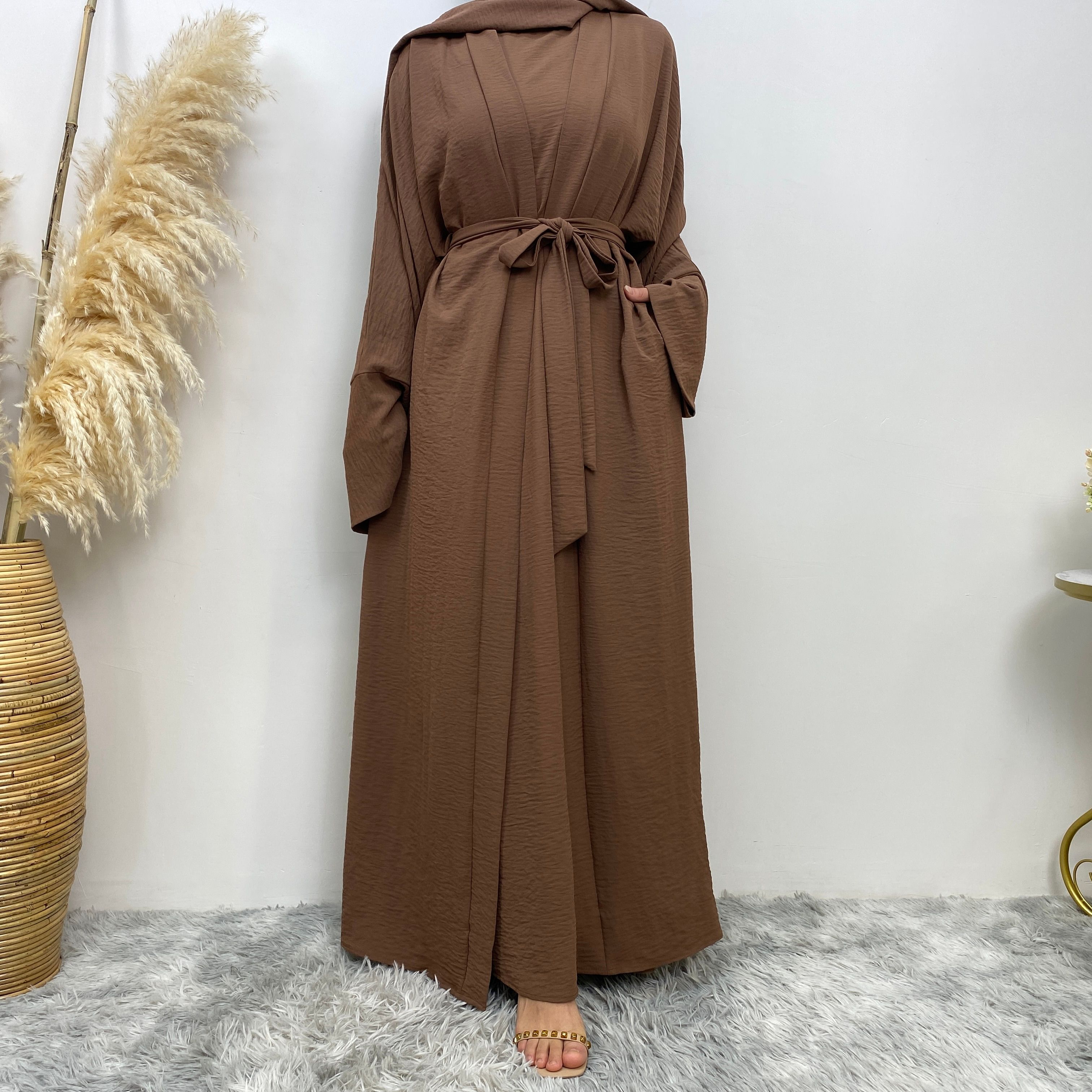 Middle Eastern simple and fashionable Muslim suit Abaya sleeveless dress with pockets for women cardigan dress