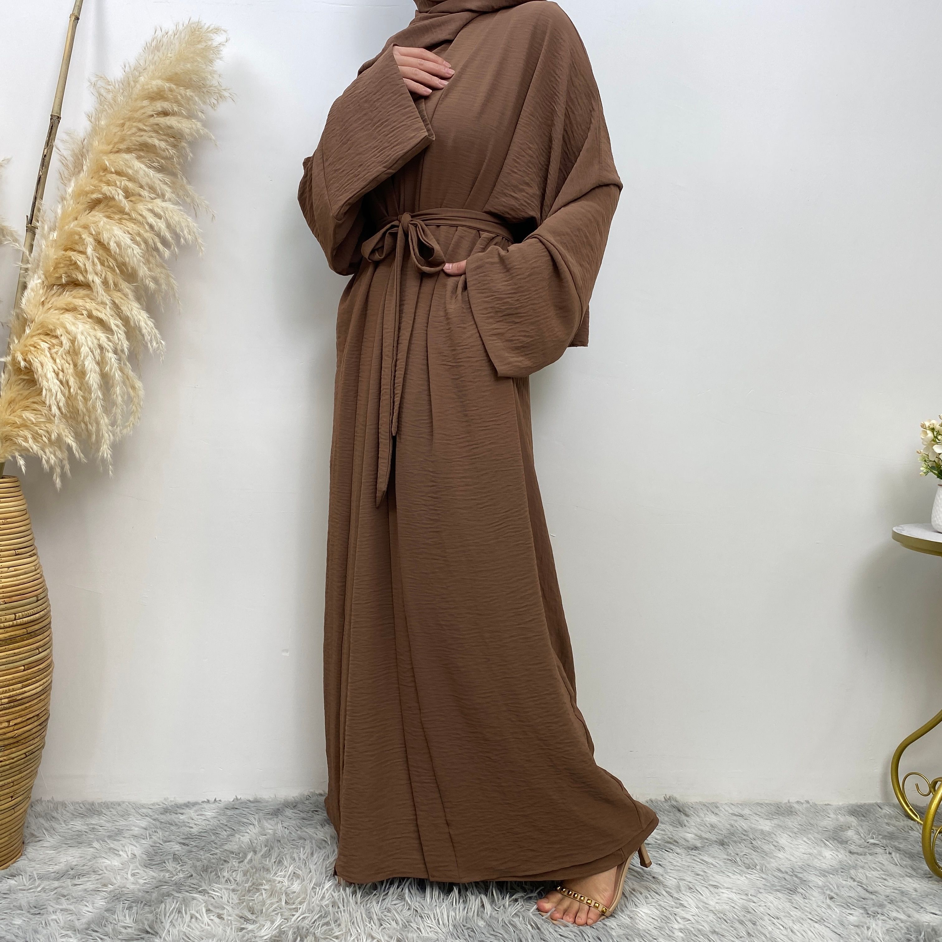 Middle Eastern simple and fashionable Muslim suit Abaya sleeveless dress with pockets for women cardigan dress