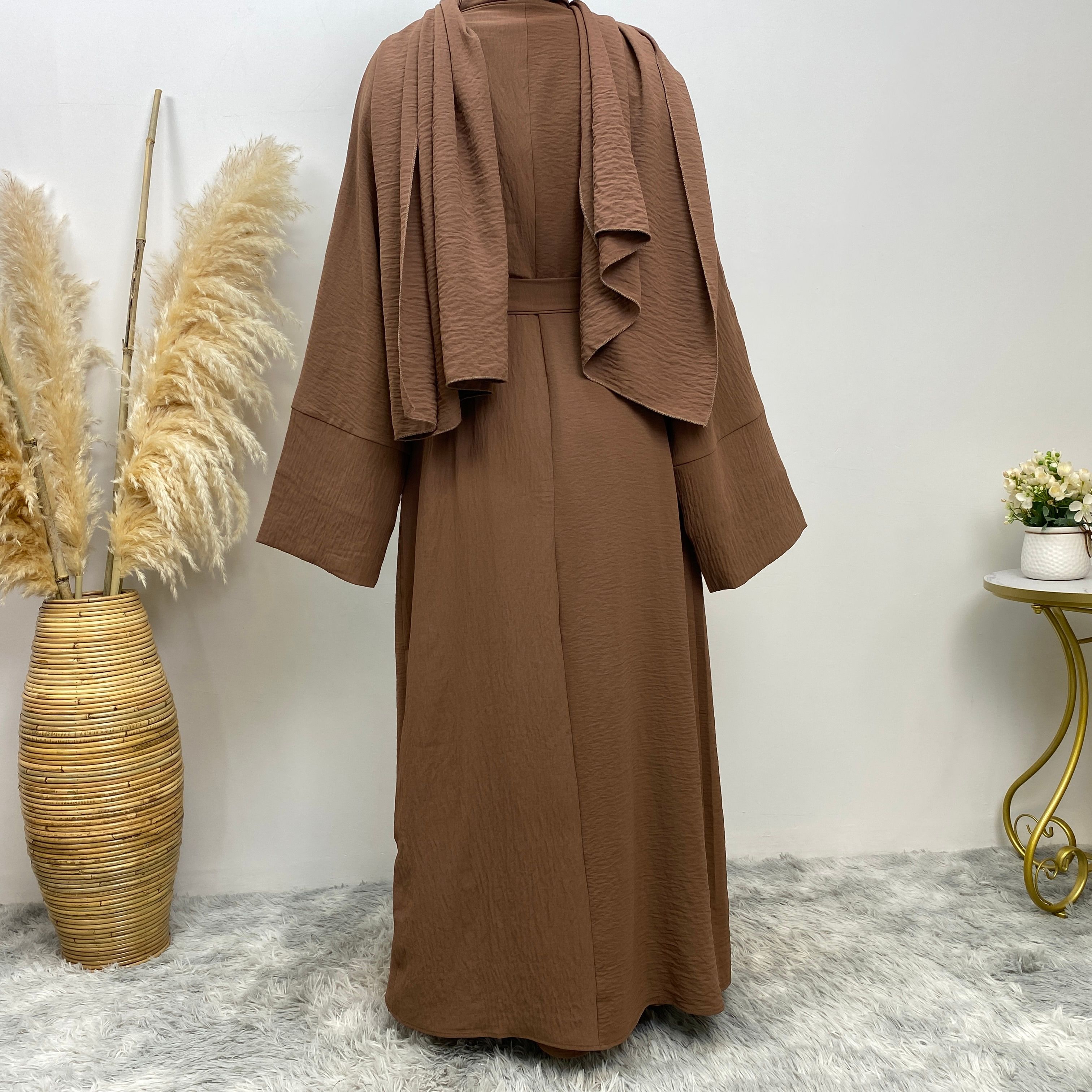 Middle Eastern simple and fashionable Muslim suit Abaya sleeveless dress with pockets for women cardigan dress