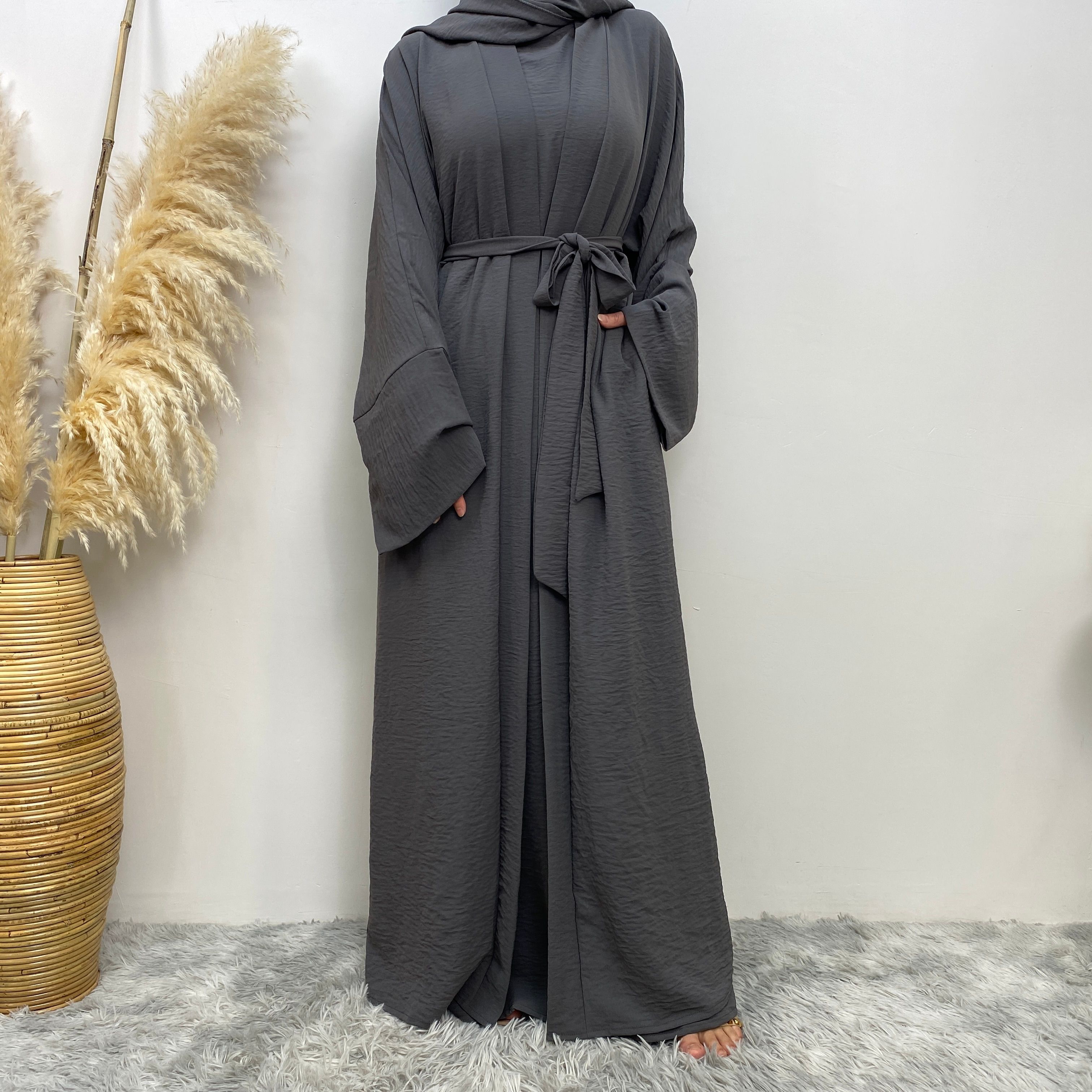 Middle Eastern simple and fashionable Muslim suit Abaya sleeveless dress with pockets for women cardigan dress