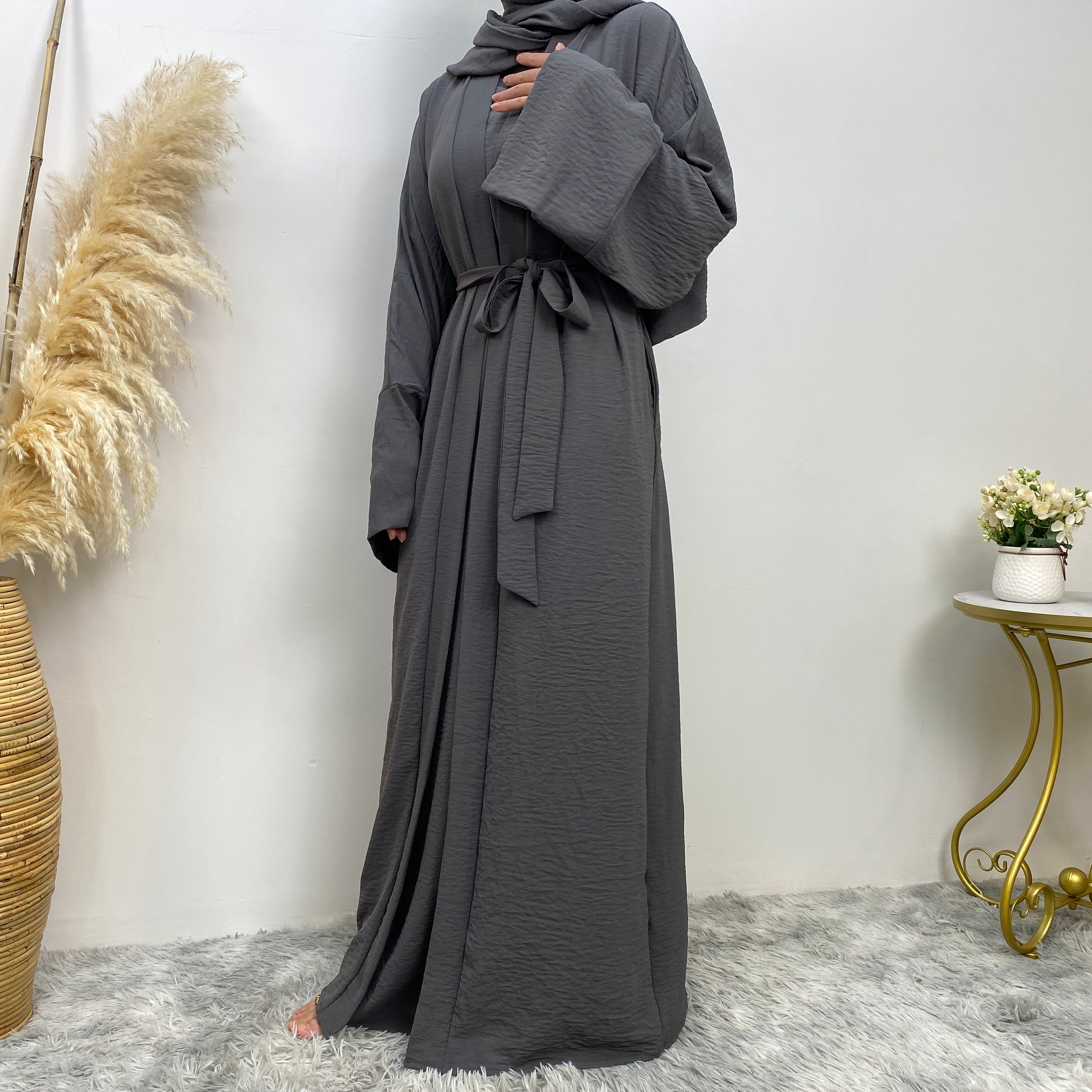 Middle Eastern simple and fashionable Muslim suit Abaya sleeveless dress with pockets for women cardigan dress