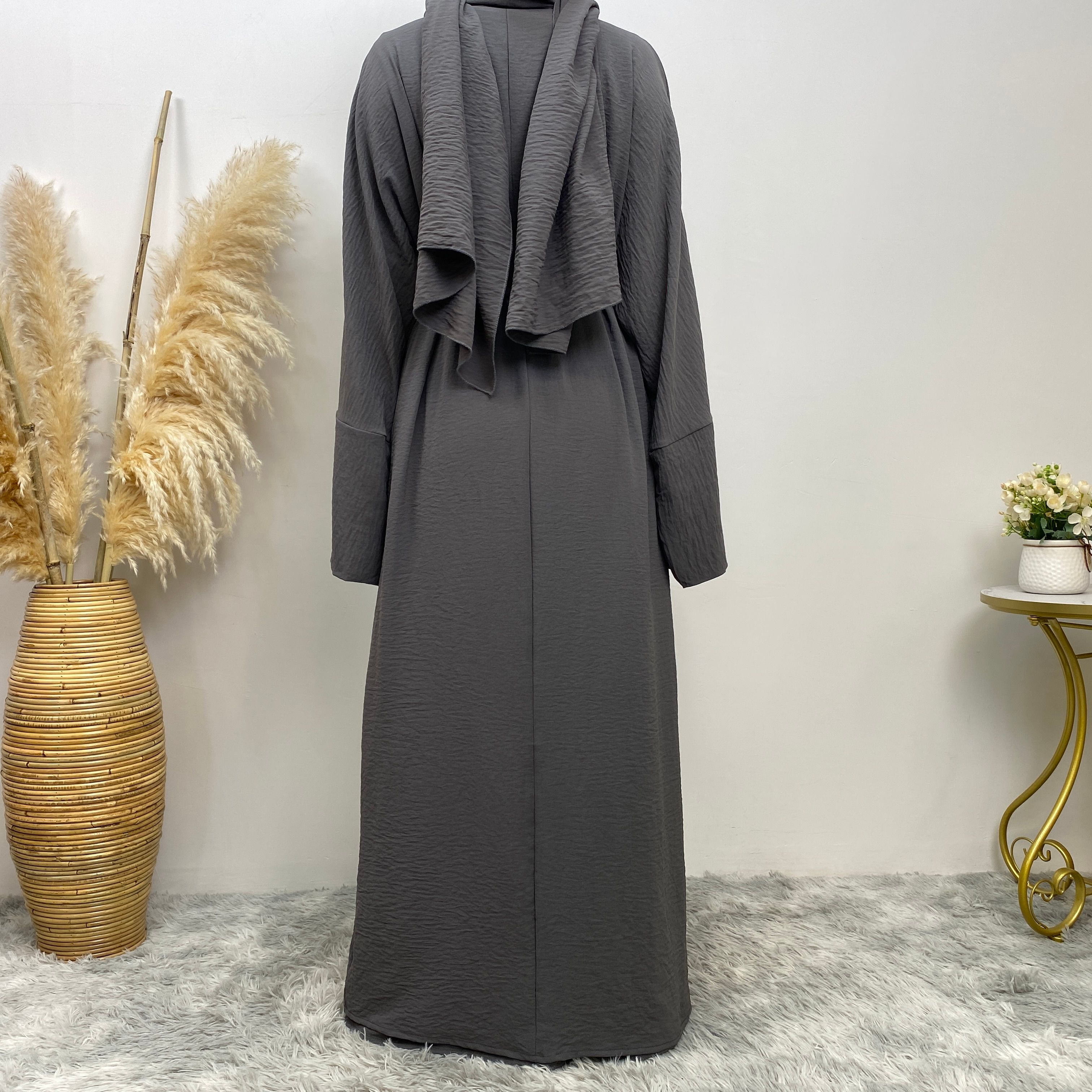 Middle Eastern simple and fashionable Muslim suit Abaya sleeveless dress with pockets for women cardigan dress