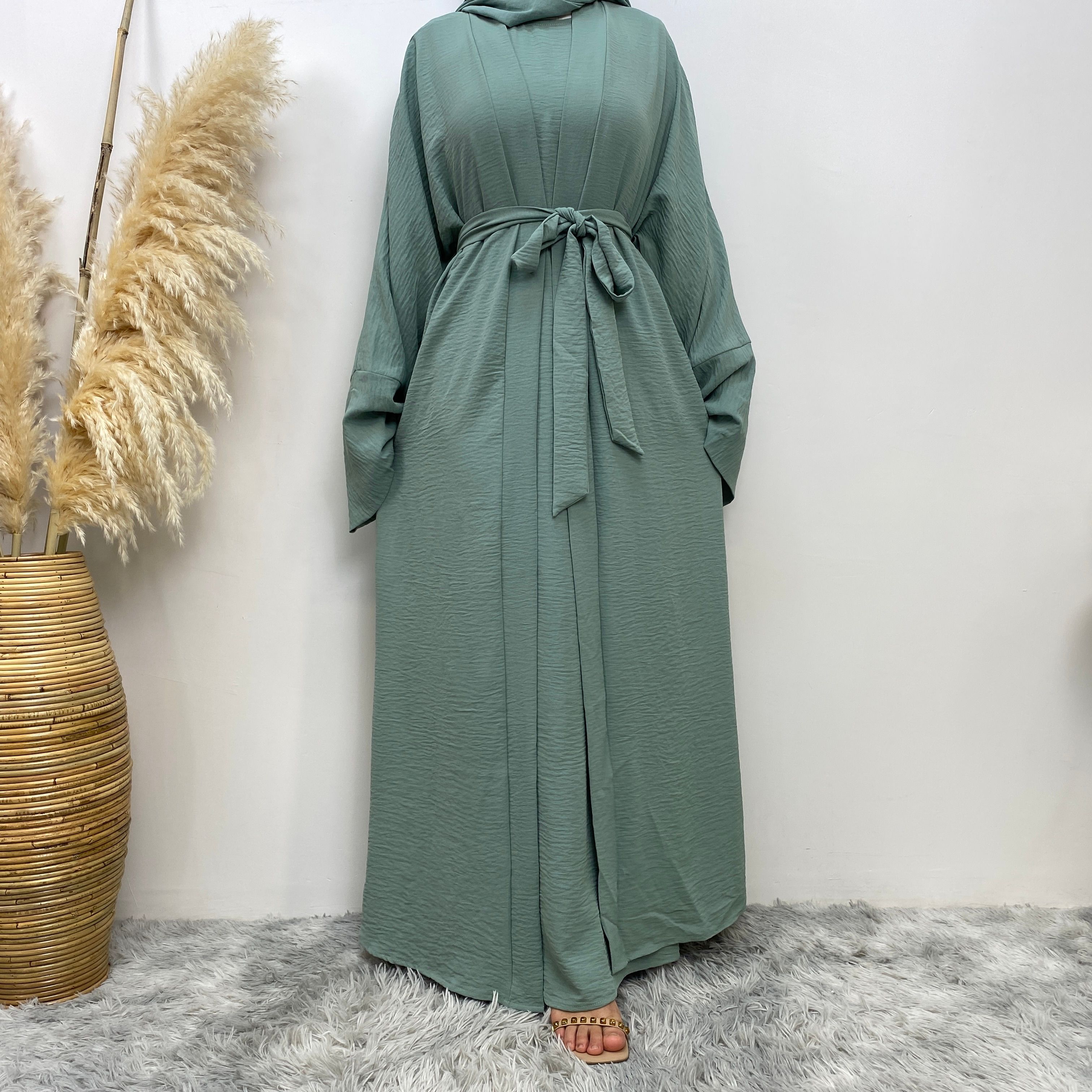 Middle Eastern simple and fashionable Muslim suit Abaya sleeveless dress with pockets for women cardigan dress