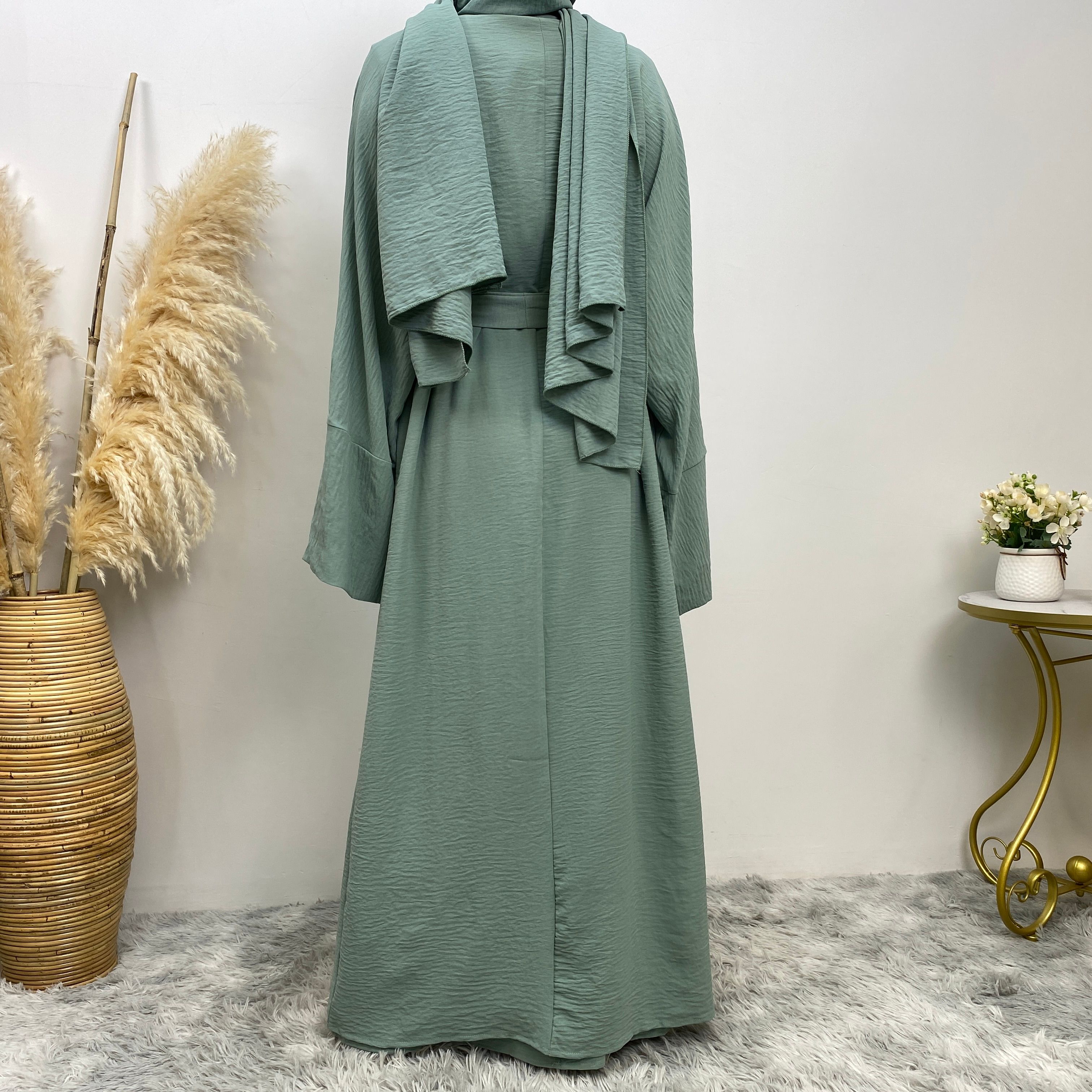 Middle Eastern simple and fashionable Muslim suit Abaya sleeveless dress with pockets for women cardigan dress