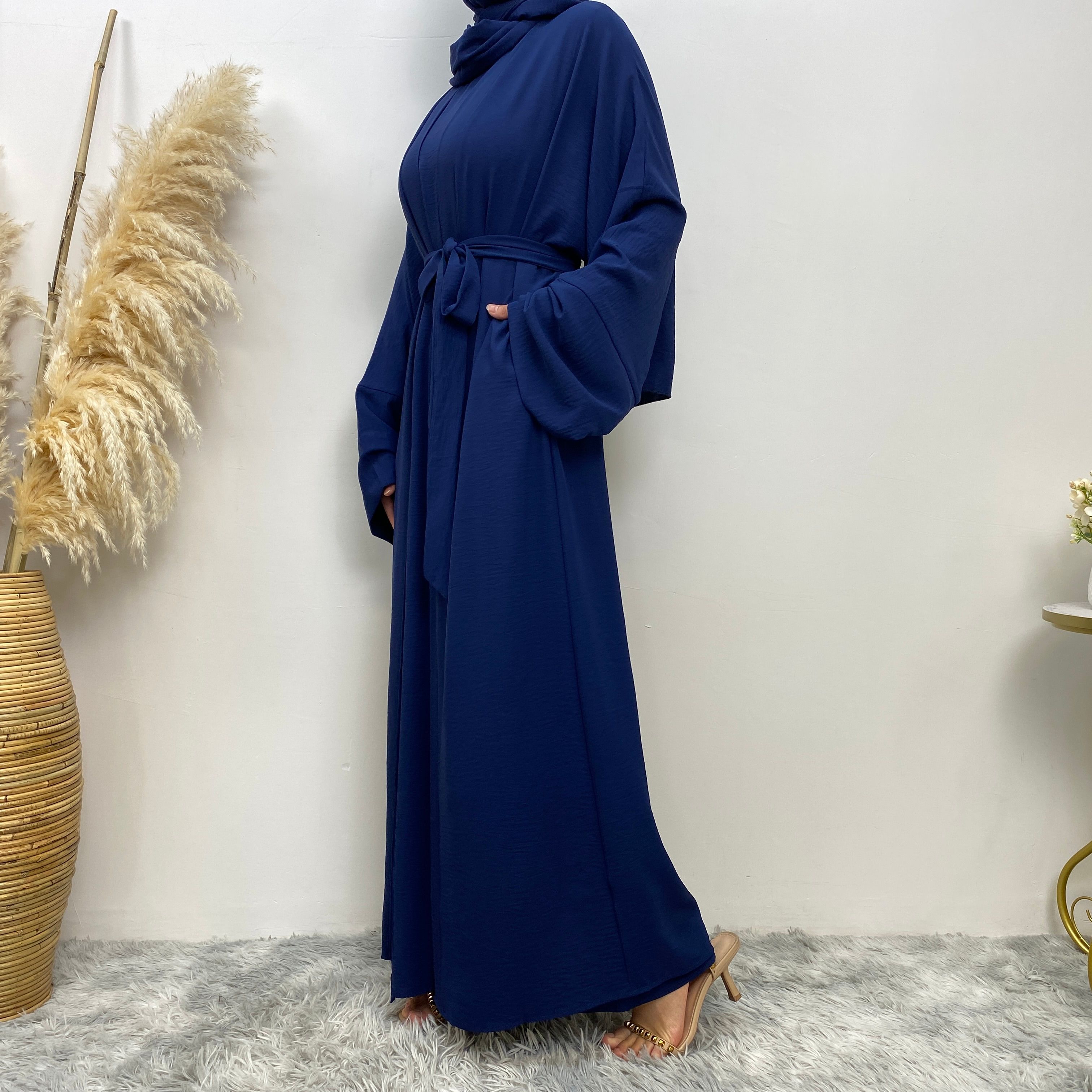 Middle Eastern simple and fashionable Muslim suit Abaya sleeveless dress with pockets for women cardigan dress