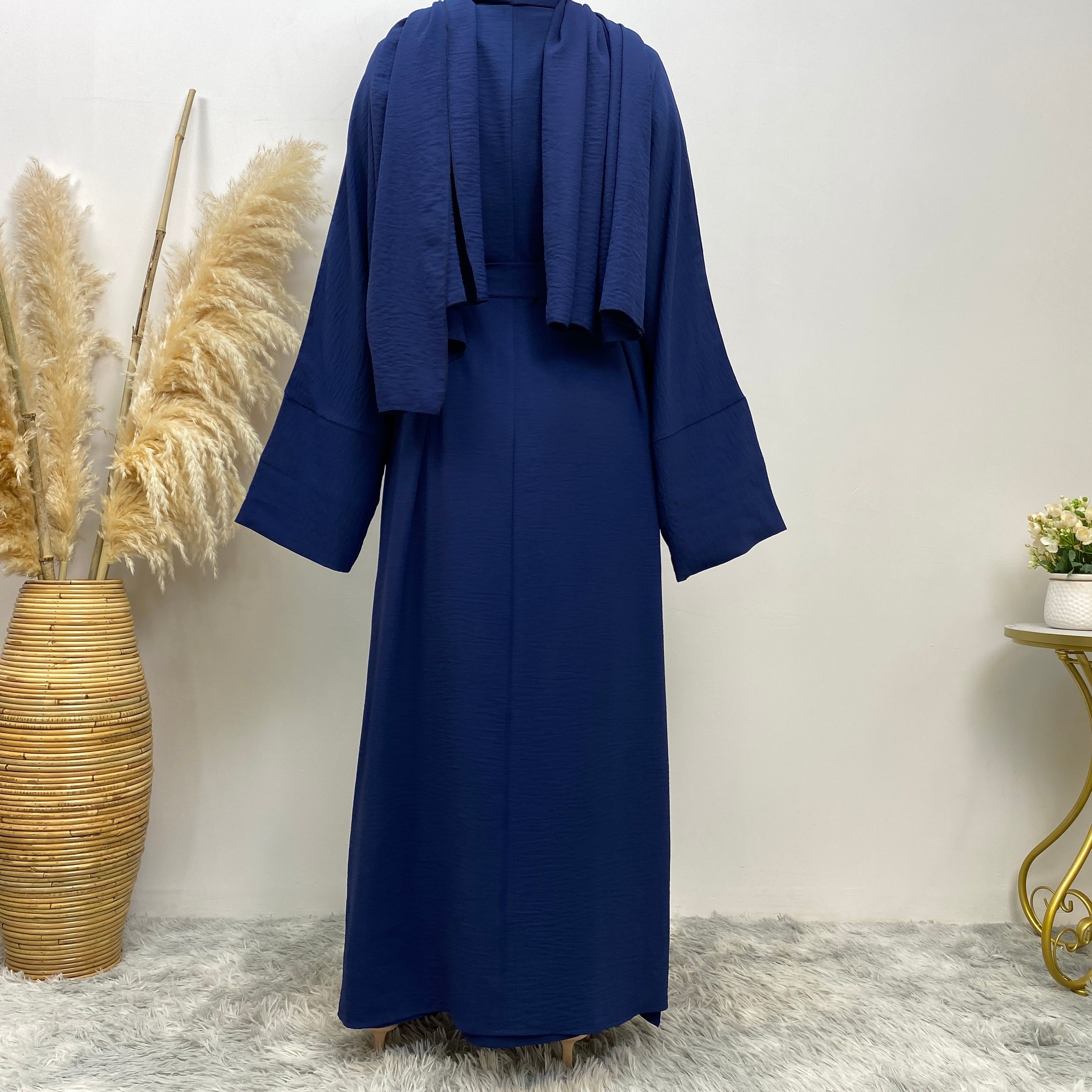 Middle Eastern simple and fashionable Muslim suit Abaya sleeveless dress with pockets for women cardigan dress