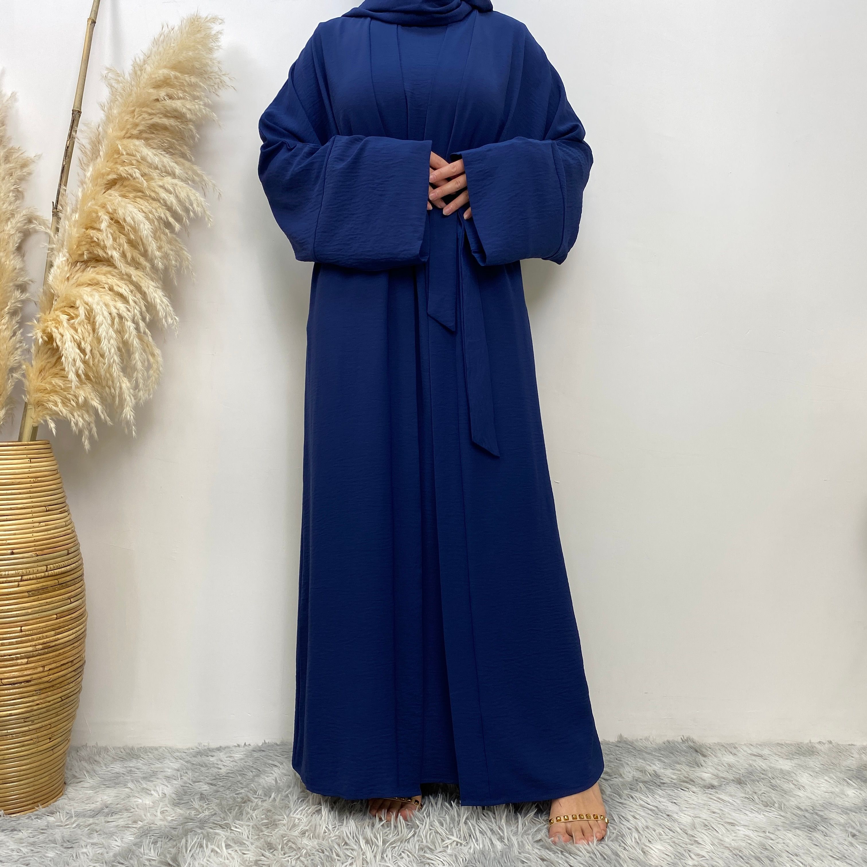 Middle Eastern simple and fashionable Muslim suit Abaya sleeveless dress with pockets for women cardigan dress