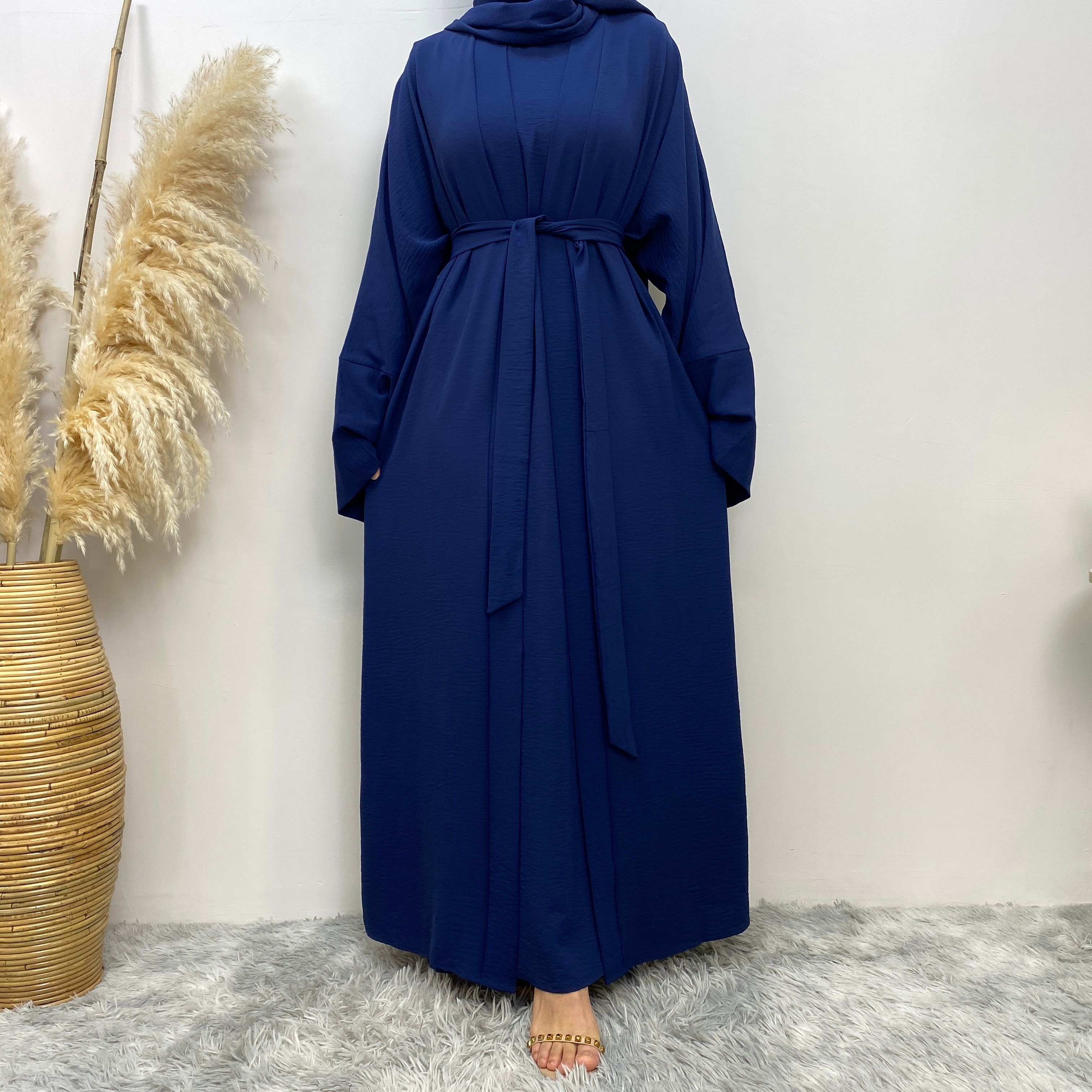 Middle Eastern simple and fashionable Muslim suit Abaya sleeveless dress with pockets for women cardigan dress