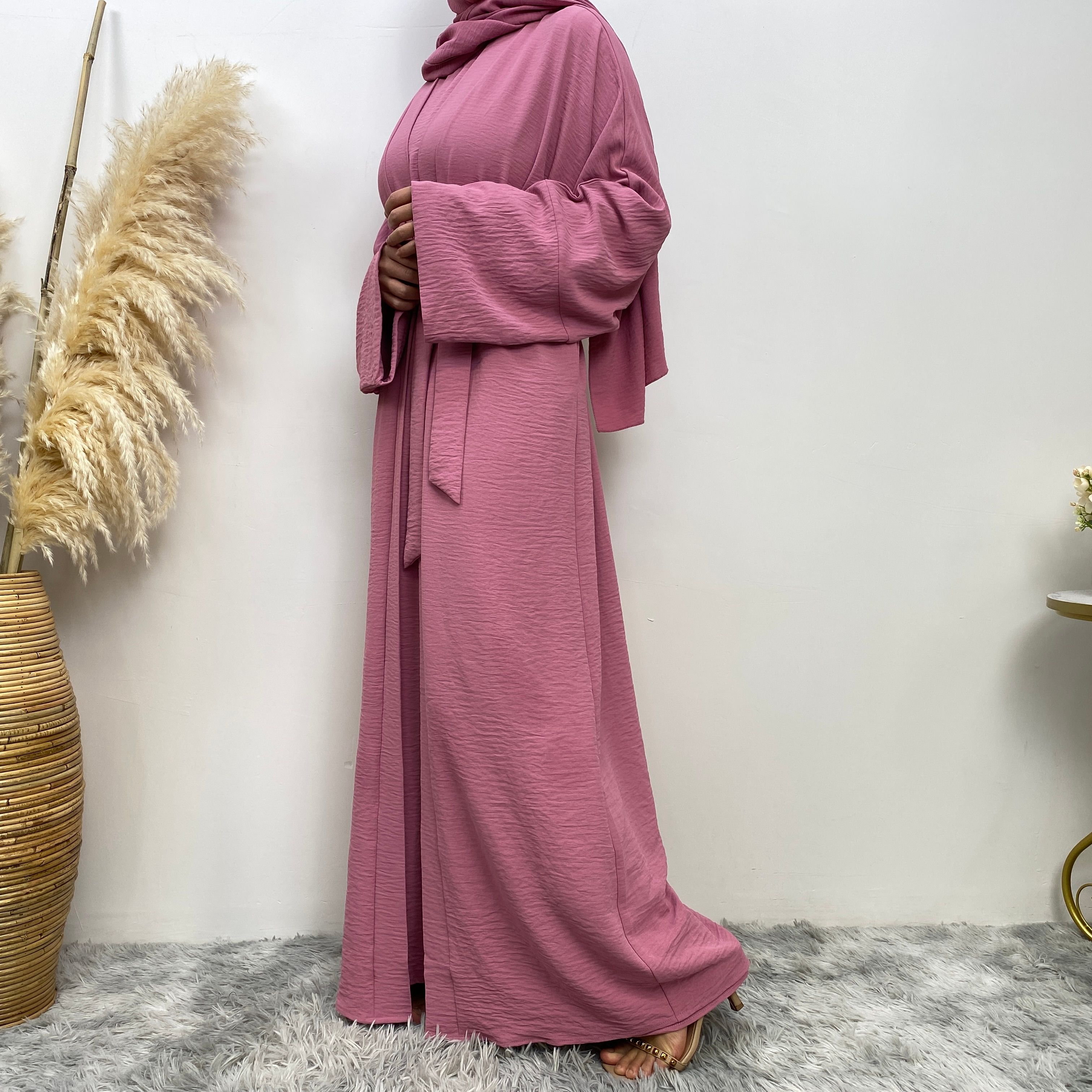 Middle Eastern simple and fashionable Muslim suit Abaya sleeveless dress with pockets for women cardigan dress