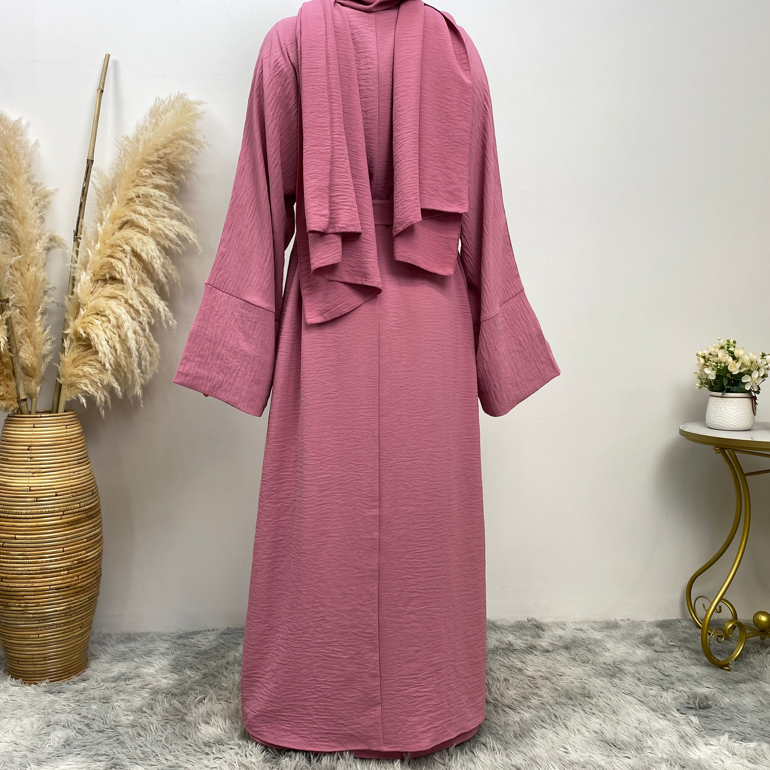 Middle Eastern simple and fashionable Muslim suit Abaya sleeveless dress with pockets for women cardigan dress